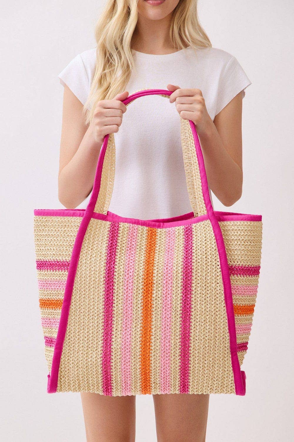 Jennifer multi-color straw beach tote bag with woven handles, perfect for summer outings and beach trips.