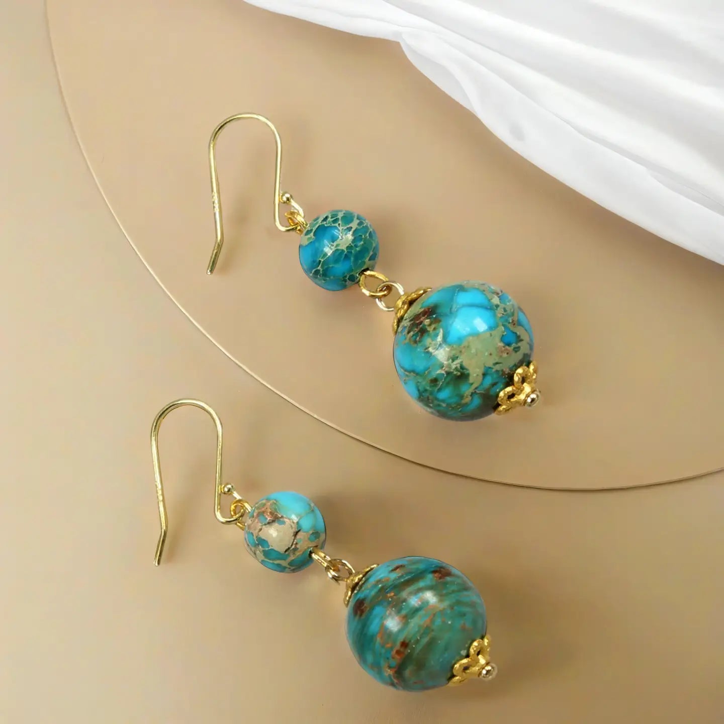 Golden Serenity Imperial Jasper earrings by Private Label Jewelry featuring polished, natural stone dangles with gold-tone accents.