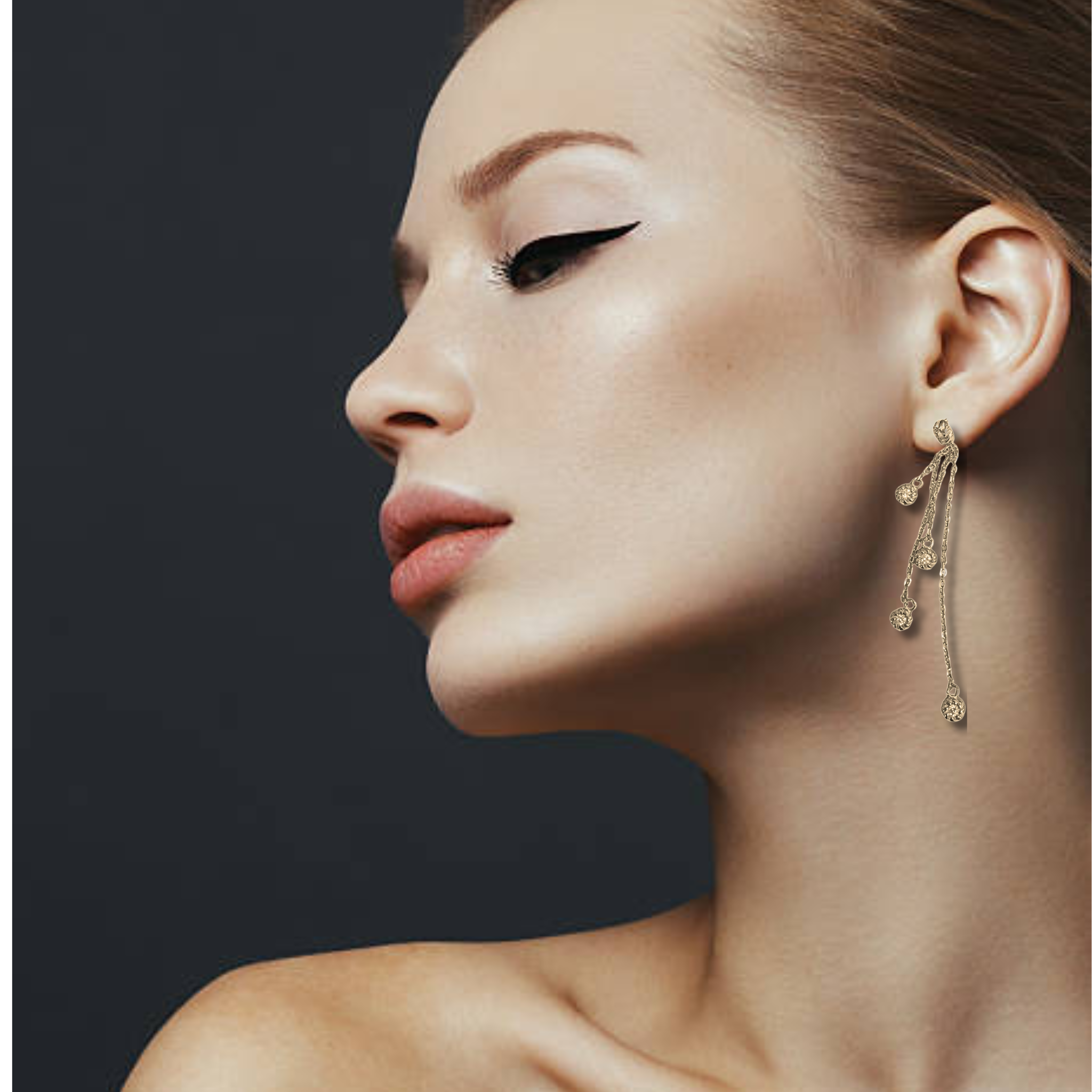 Private label droplet earrings featuring sparkling Austrian Swarovski crystals, elegant jewelry accessory with a delicate drop design.