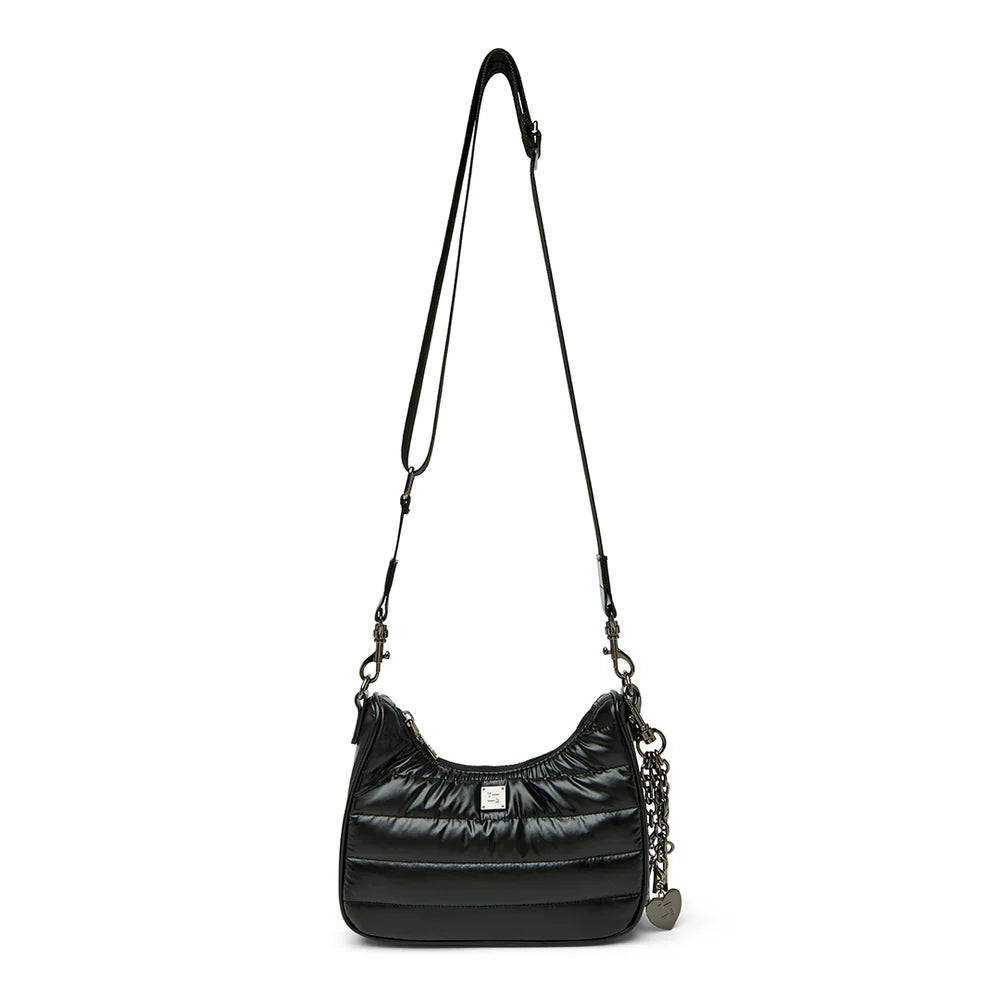 Black quilted Think Royln shoulder bag featuring a stylish chain detail on a white background.