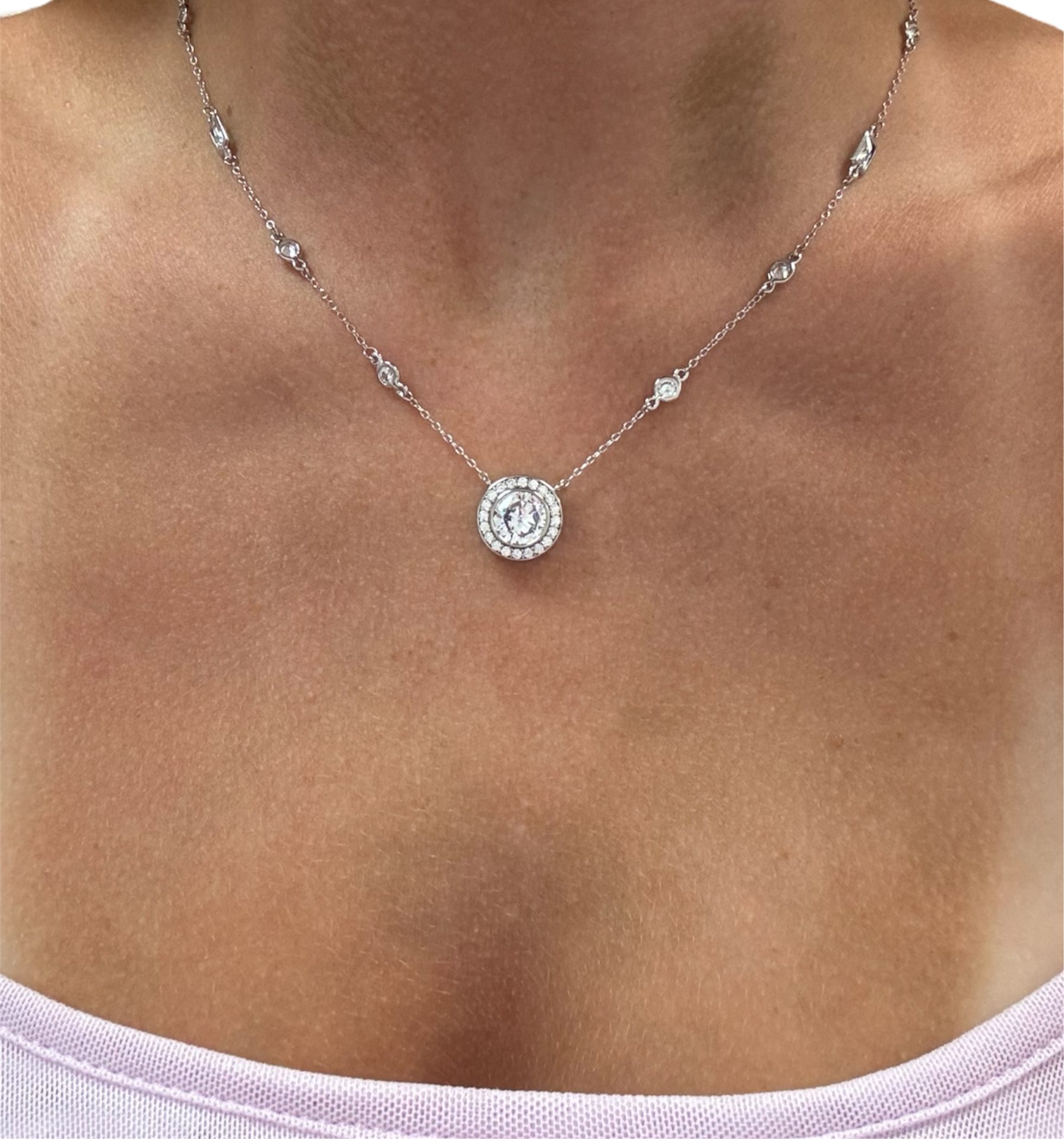 Sterling silver 925 Luna Circle Necklace featuring a sleek design and a polished finish, elegantly hanging from a chain.
