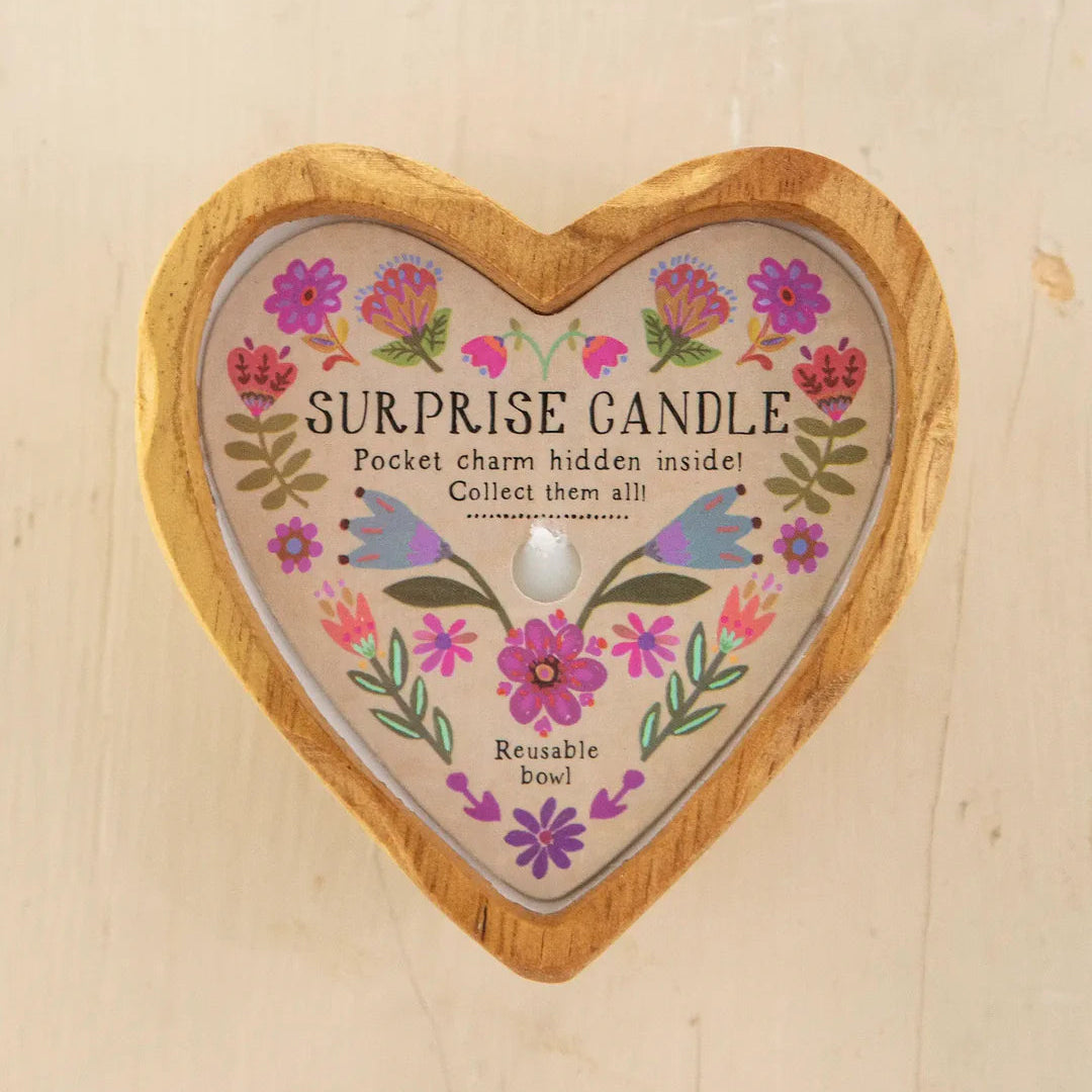 Natural Life wooden heart surprise candle with intricate heart-shaped design and natural wood finish, perfect for decorative use.