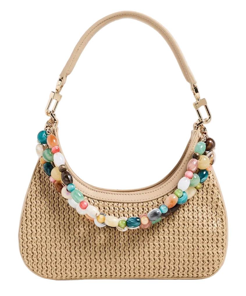 Dolce Vita Solen shoulder bag in vibrant color, featuring sleek design and adjustable strap, stylish accessory for everyday use.