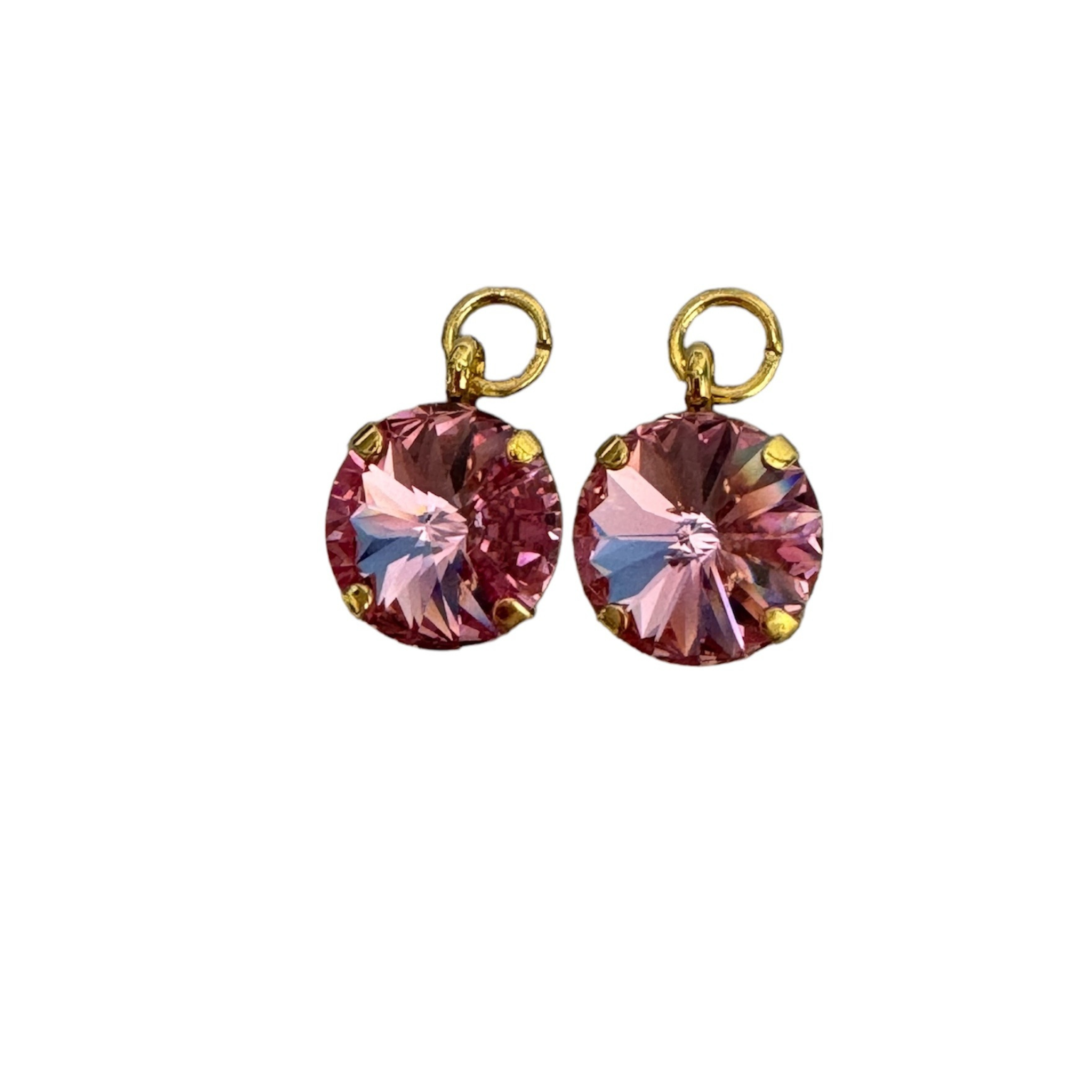 Pink crystal charm earrings featuring a delicate design and shimmering details from a private label brand.