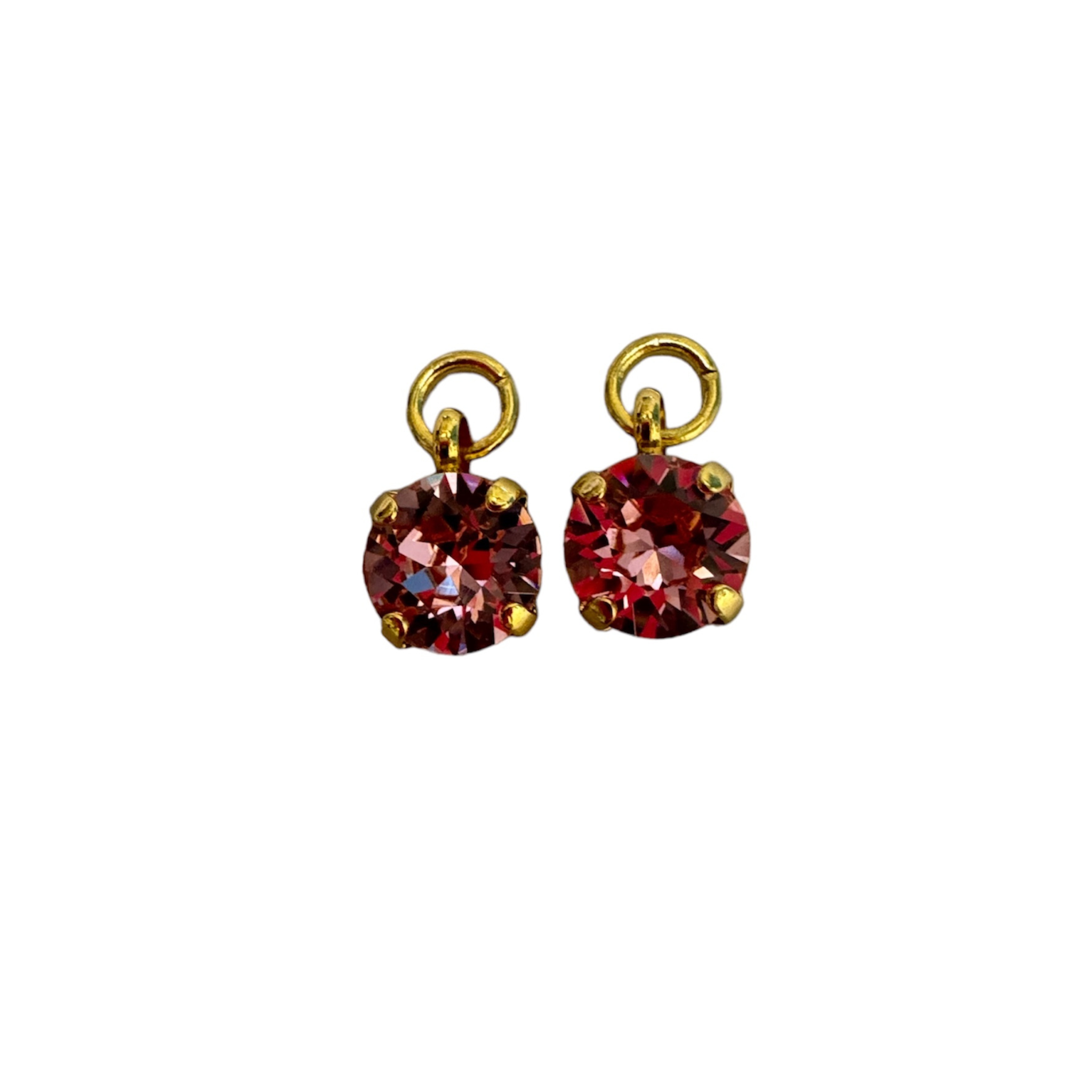 Pink crystal charm earrings from private label, featuring a sparkling design and delicate detailing.