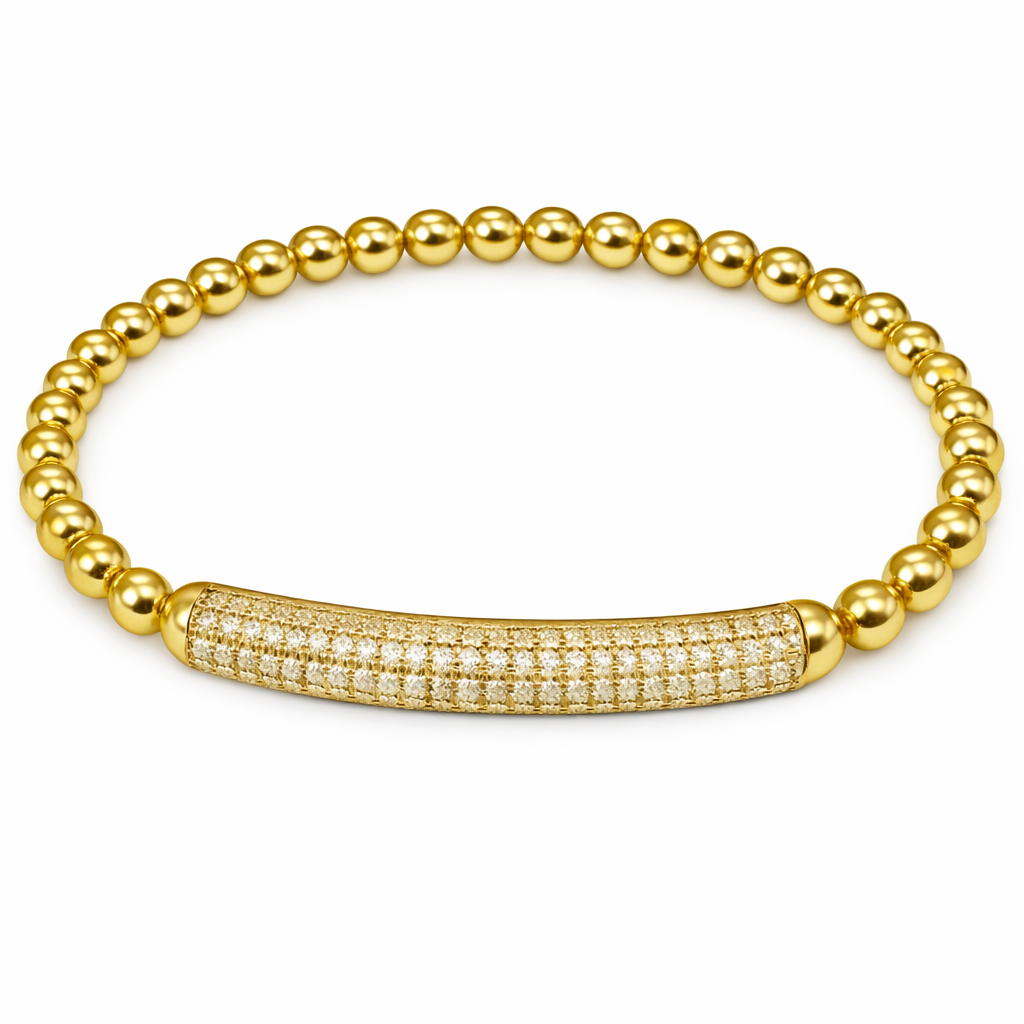 Gold beaded bracelet with a diamond-studded clasp on a white background