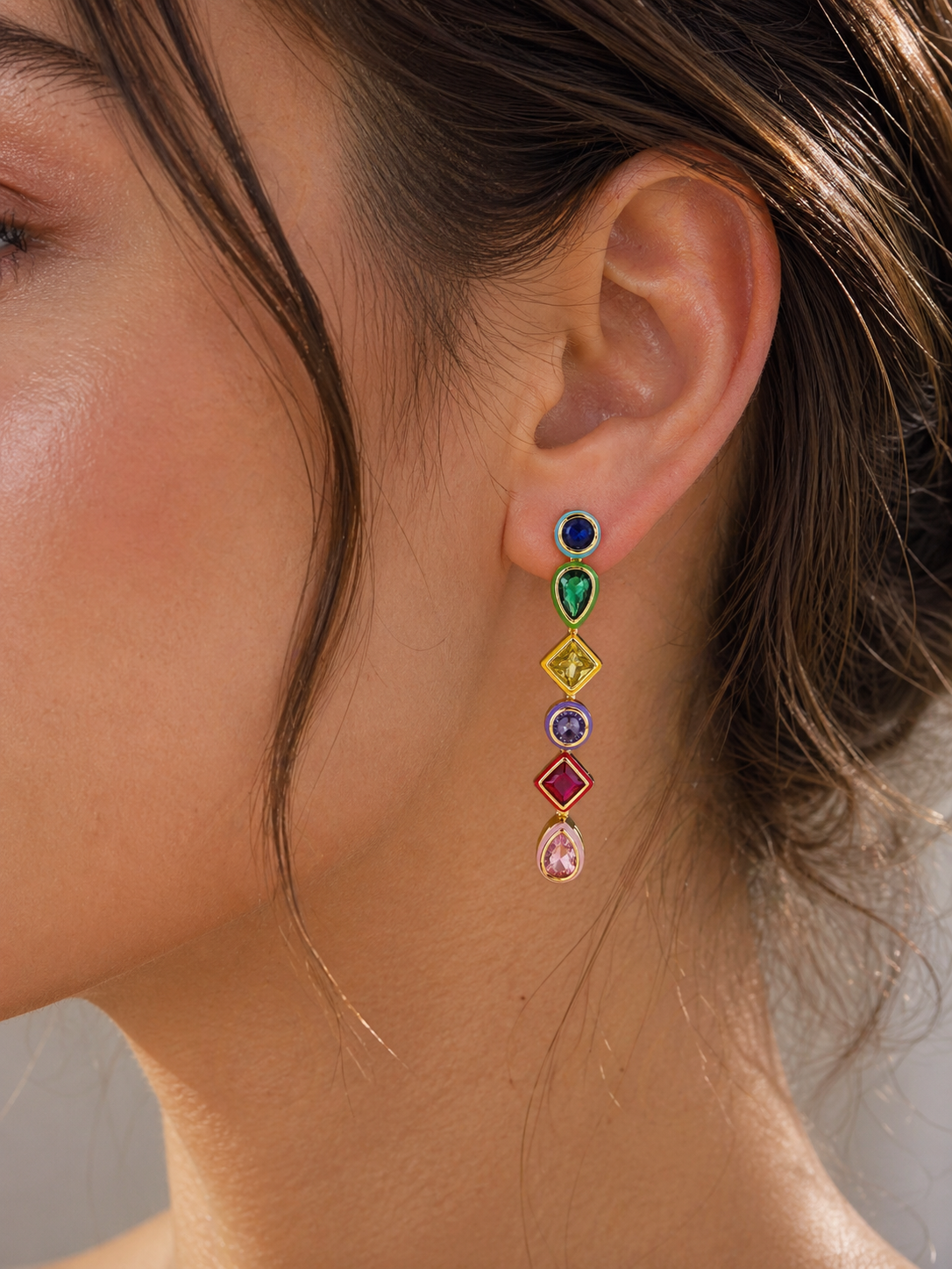 Elegant multi-jewel drop earrings from Private Label featuring sparkling gemstones and intricate metalwork.