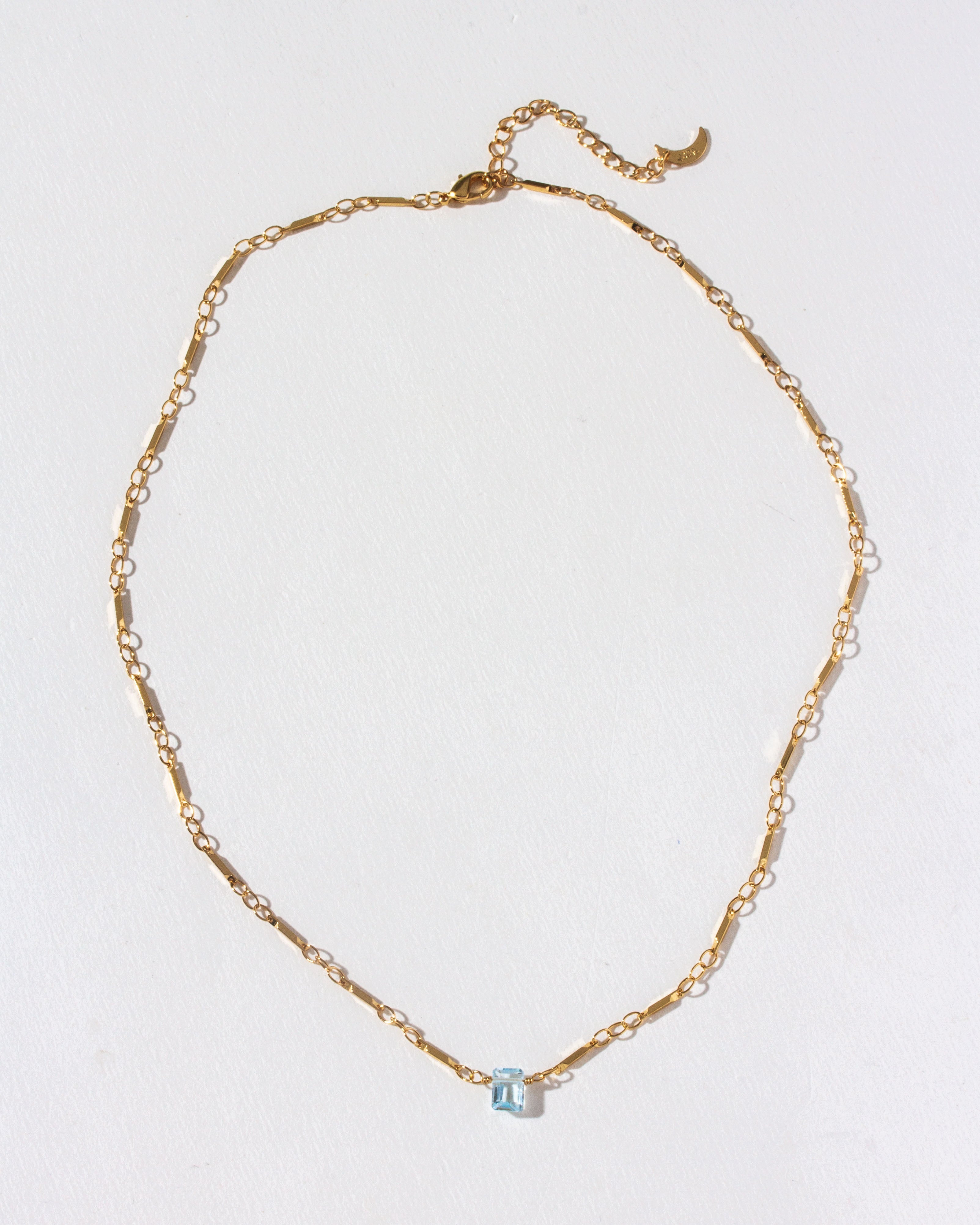 Luna Norte Prism Gems December birthstone necklace featuring a sparkling gemstone pendant on a delicate chain.