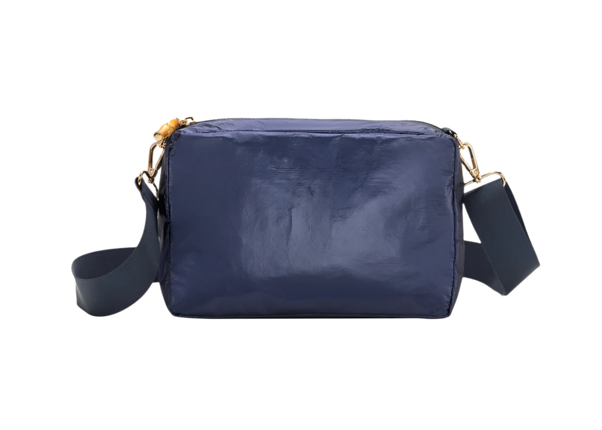 Bourban and Bamboo crossbody bag in a stylish design with adjustable strap and textured fabric.