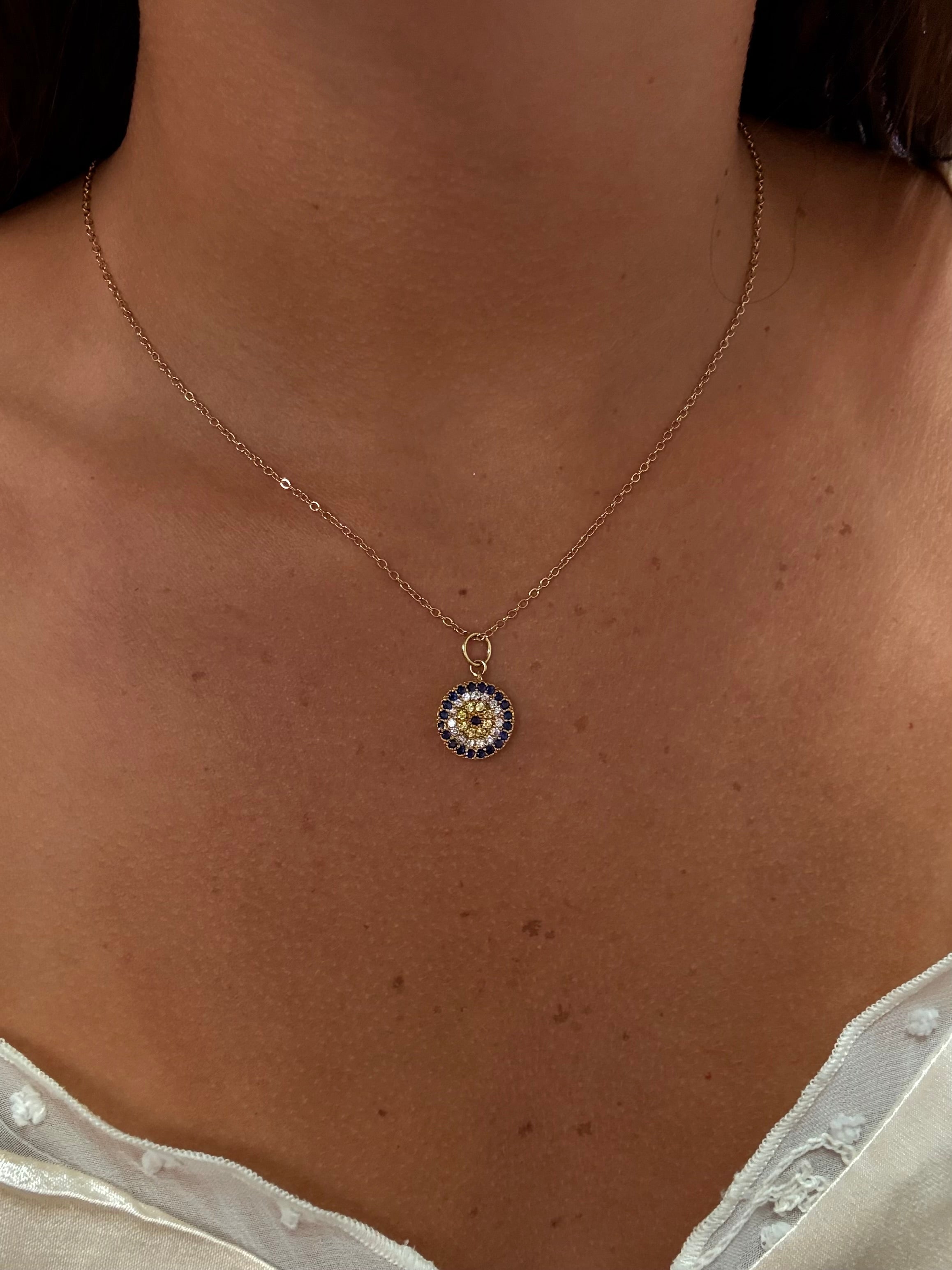 Sterling silver 925 evil eye necklace by Private Label Jewelry, featuring a delicate design and vibrant eye centerpiece.