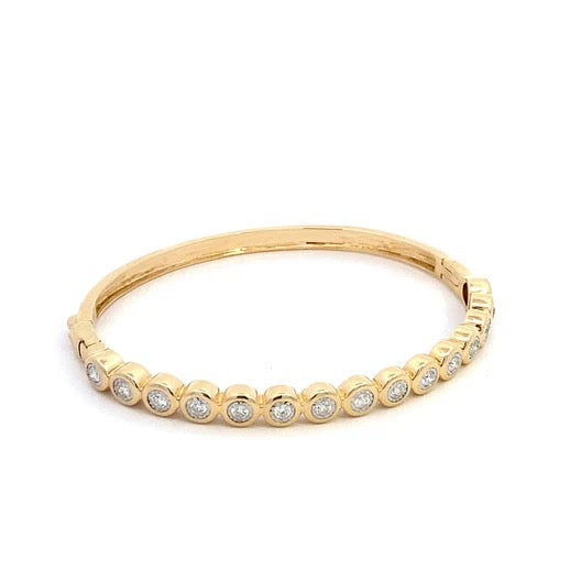 Gold tennis bracelet bangle by The Skylar Project with a sleek, polished design featuring a delicate chain and secure clasp.