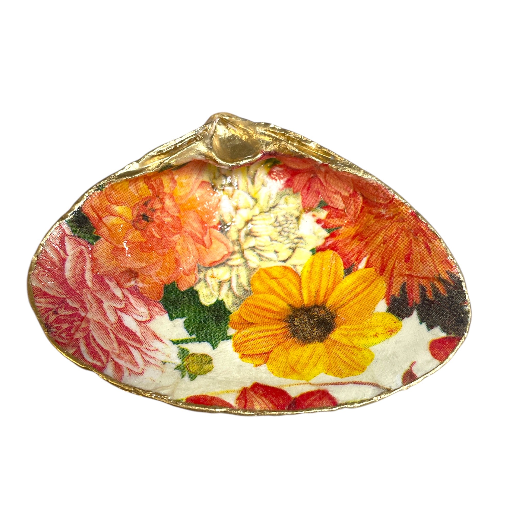 Colorful decoupage shells arranged artistically on a neutral background, showcasing intricate designs and textures.