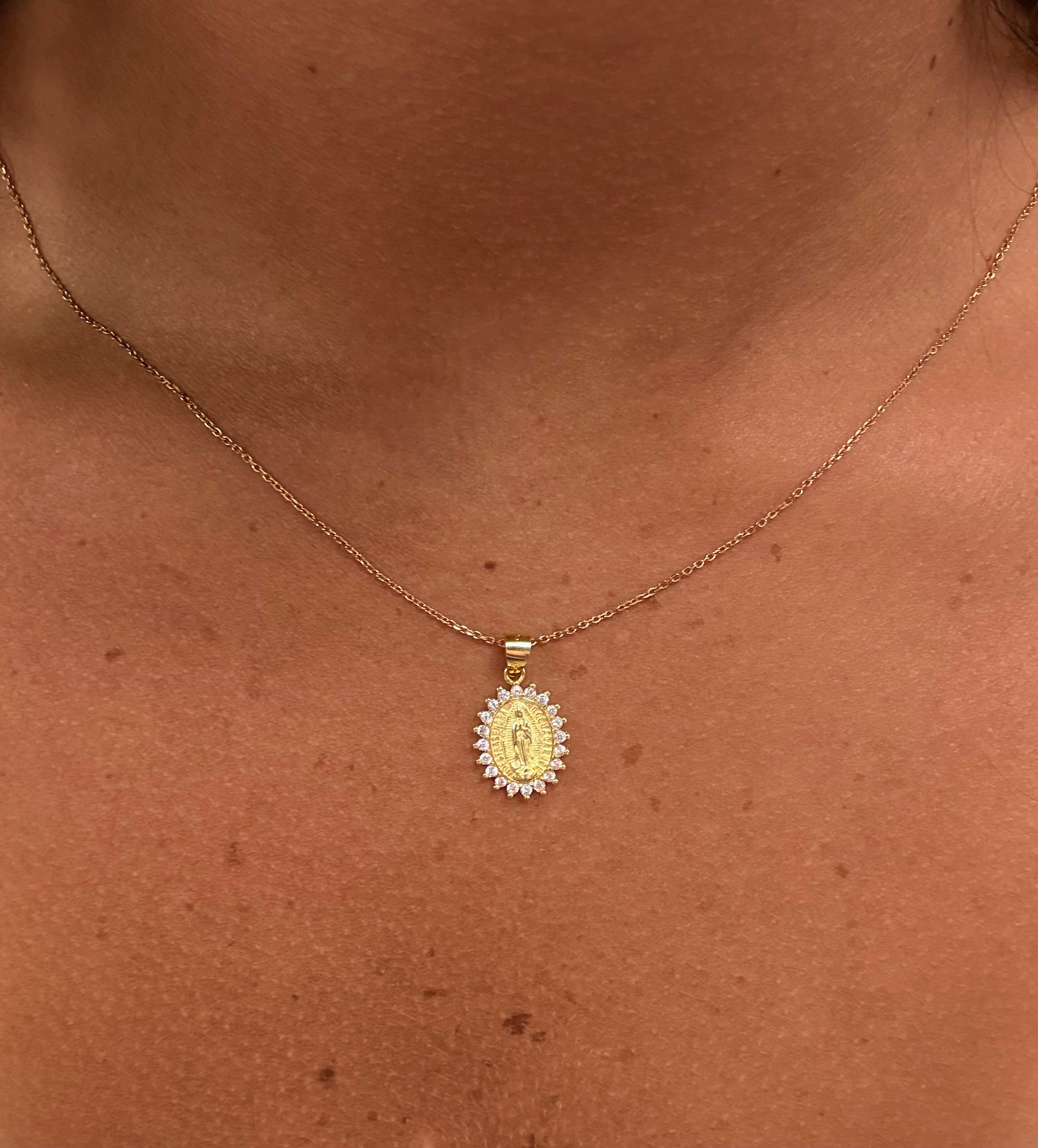 Pope Necklace by Private Label Jewelry featuring a delicate chain and a detailed pendant design in gold tone.