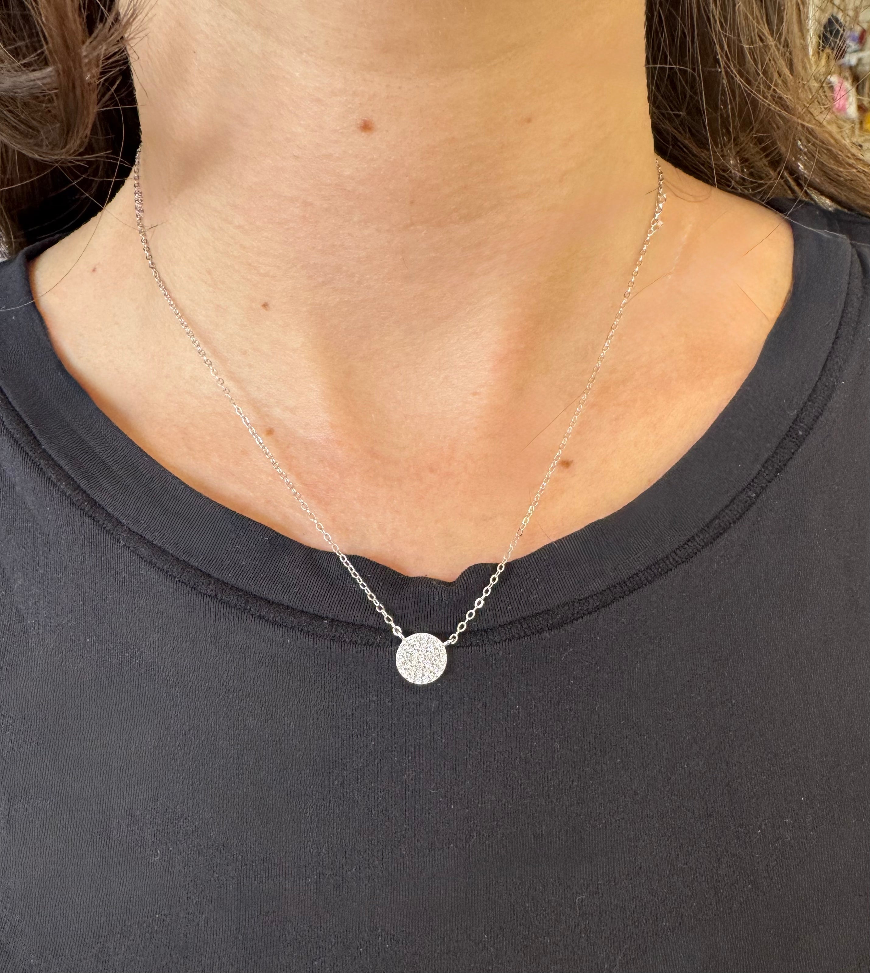 Elegant Roundabout Necklace by SA featuring a unique circular pendant design on a delicate chain.