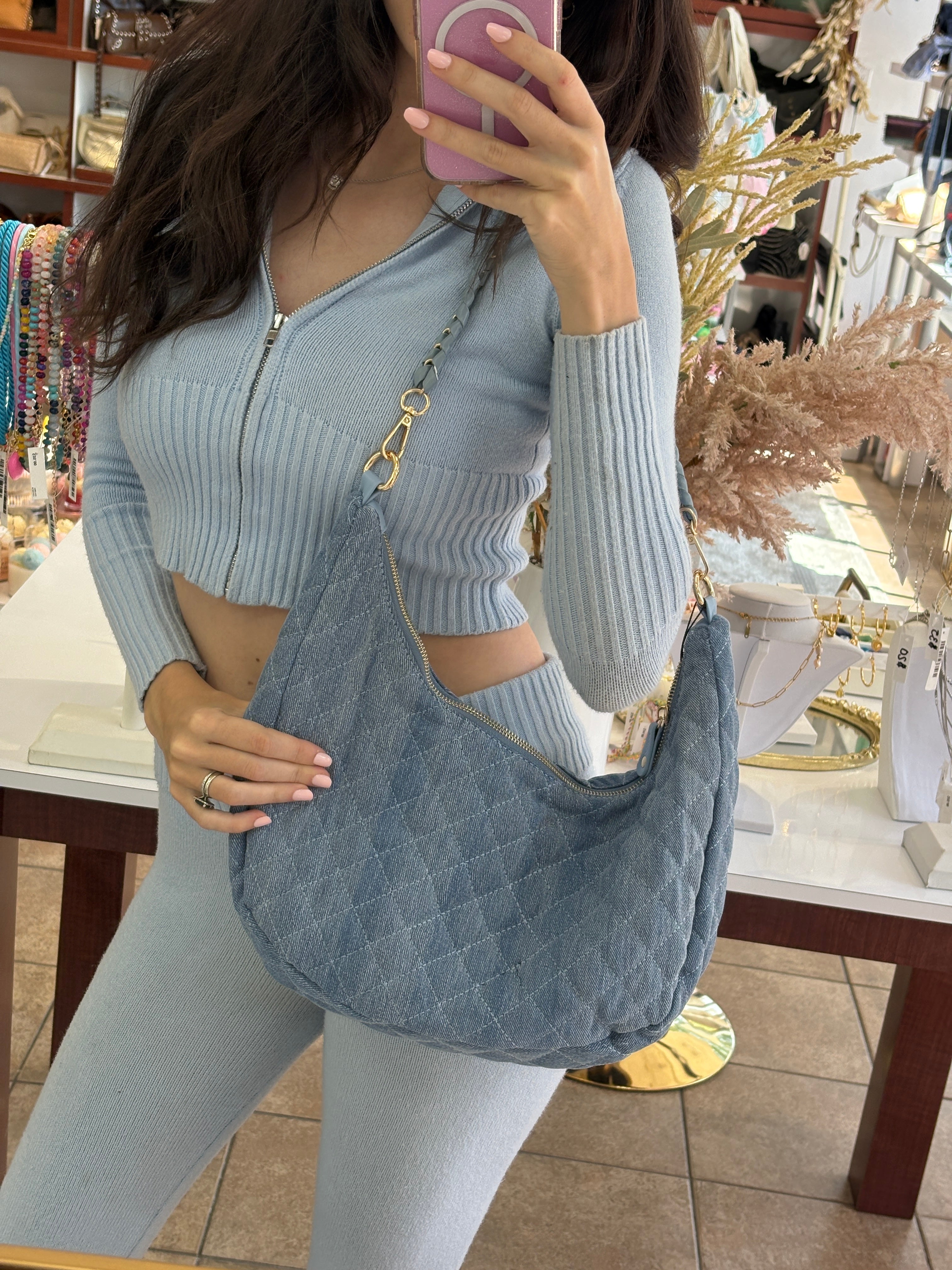 Bc Handbags quilted hobo crossbody bag with adjustable strap and zippered pocket, featuring a stylish quilted design.