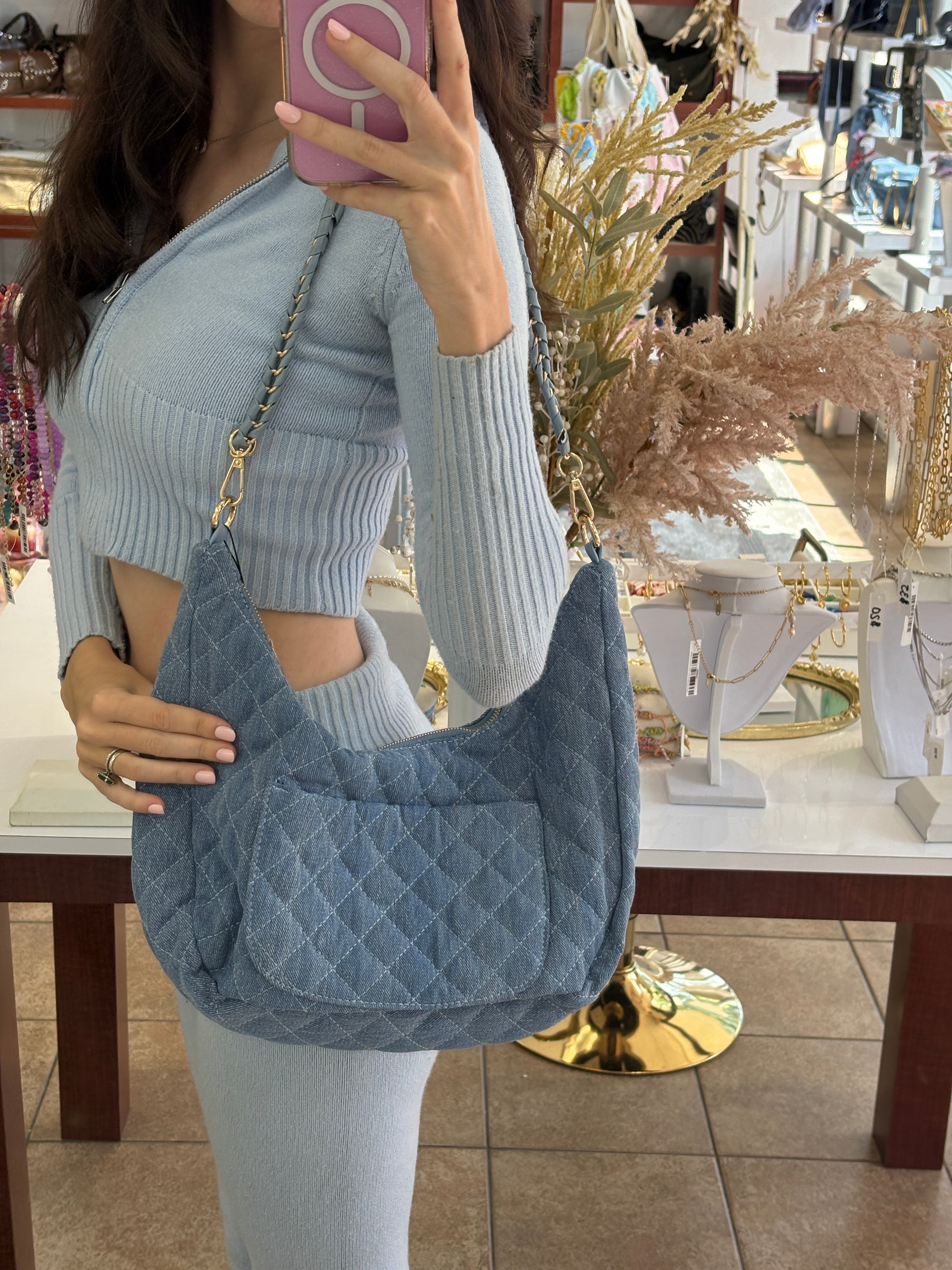 Bc Handbags quilted hobo crossbody bag with adjustable strap and stylish design, shown in a close-up image.