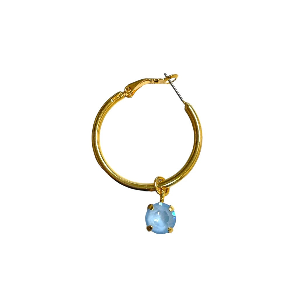 8.5mm baby blue crystal charms for hoops and necklaces, showcasing their sparkling design and elegant color.