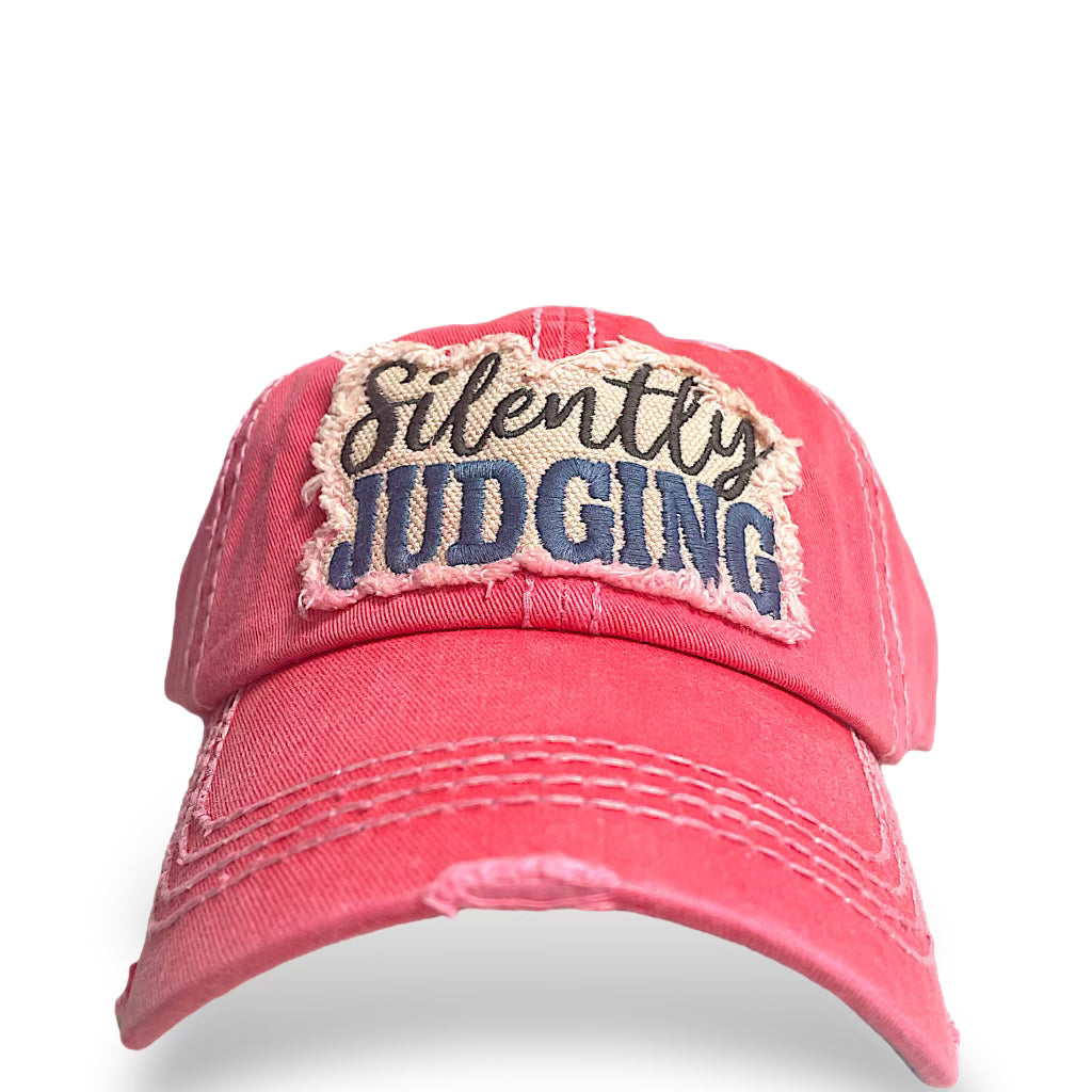 Black "Silently Judging" hat from a private label, featuring bold white text and a classic cap design.