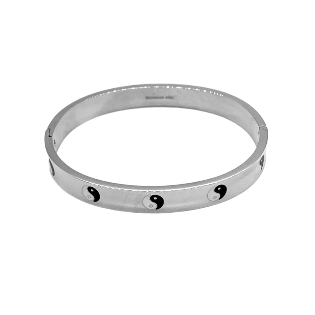 Silver Ying & Yang stainless steel bangle bracelet with polished finish, featuring a balanced black and white design.