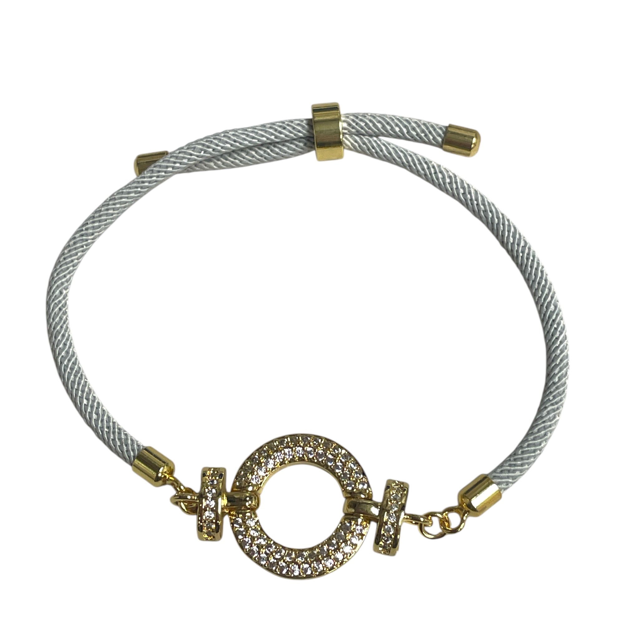 Brenda Perruzza Jewelry rope pulley bracelet with layered cords and metallic accents, stylish and adjustable accessory.