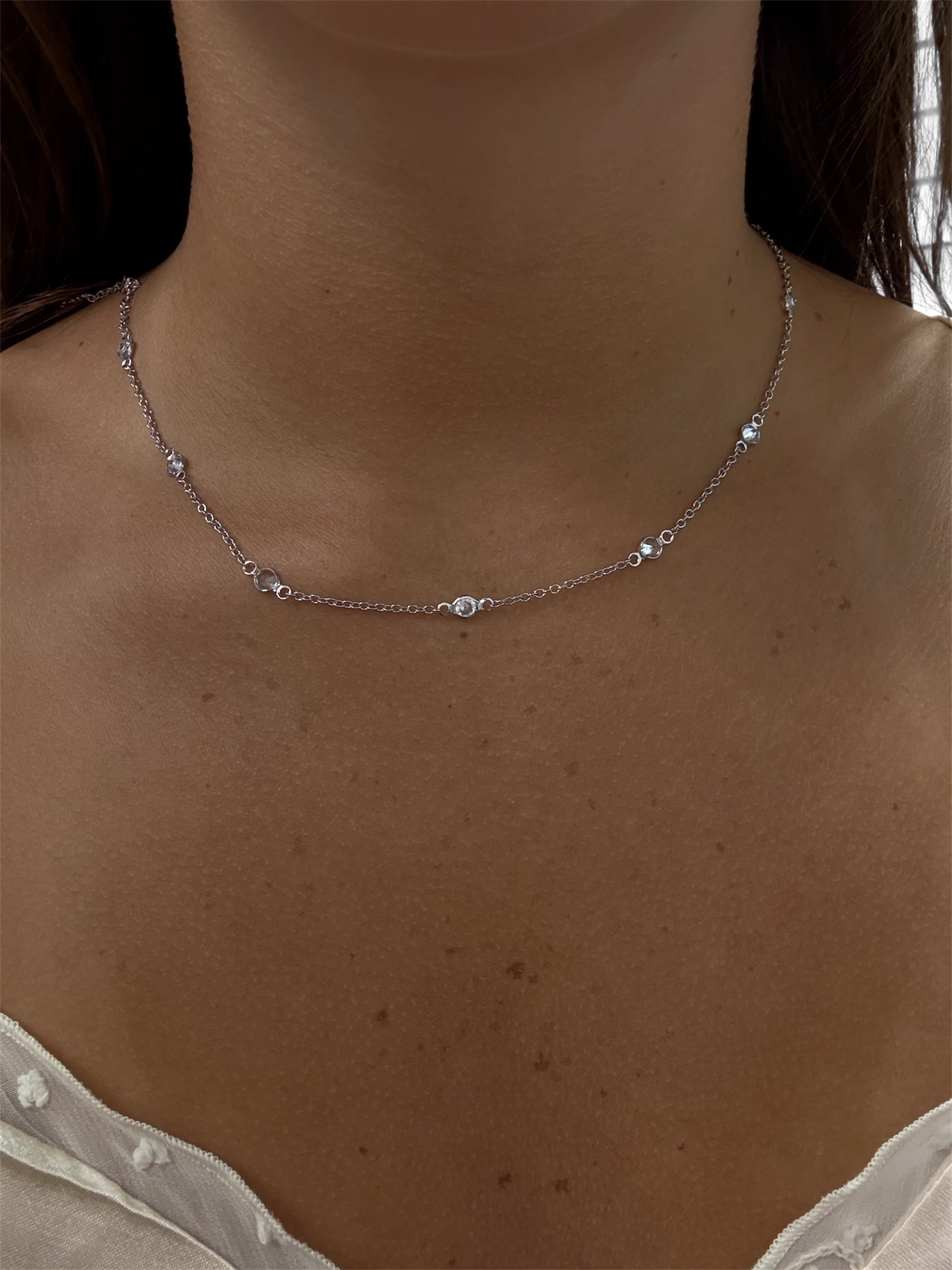 Sterling silver 925 diamond choker necklace with a delicate design, showcasing sparkling diamonds and a stylish clasp.