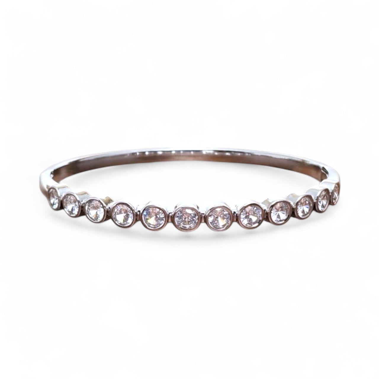 Gold tennis bracelet hard bangle by The Skylar Project with a sleek, polished design and secure clasp.
