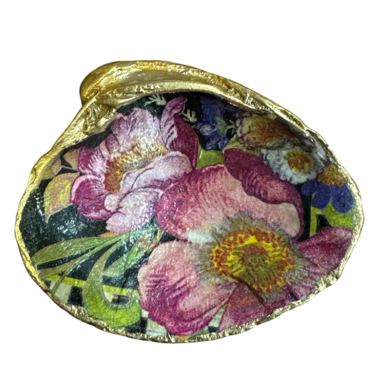 Colorful decoupage shells arranged as a decorative item on a neutral background, showcasing intricate designs and textures.