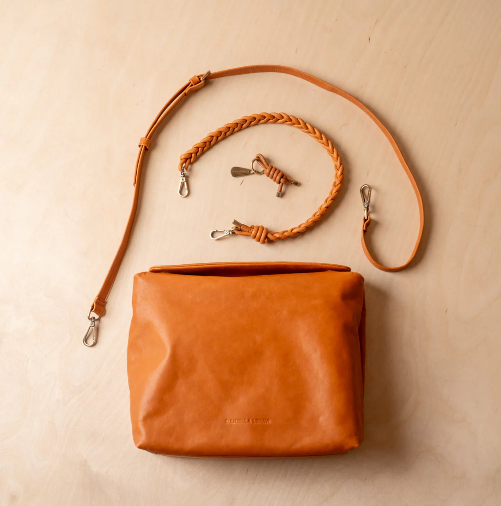 Daniella Lehavi Arizona Satchel tote in tan leather with stylish handles and a spacious interior, perfect for everyday use.