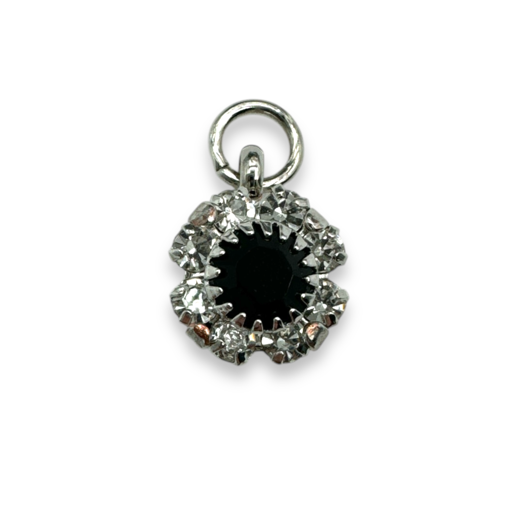 Silver floral charm from private label collection, featuring intricate flower design, perfect for jewelry or accessories.