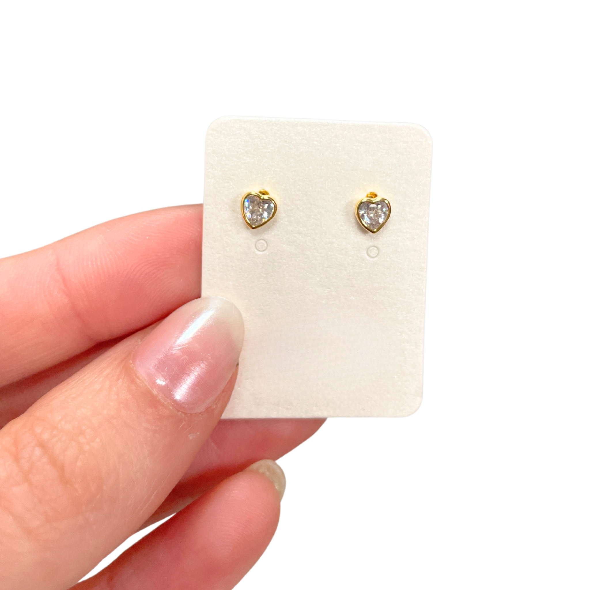 Mini clear heart CZ stud earrings by Private Label featuring a delicate design and sparkling cubic zirconia stones.