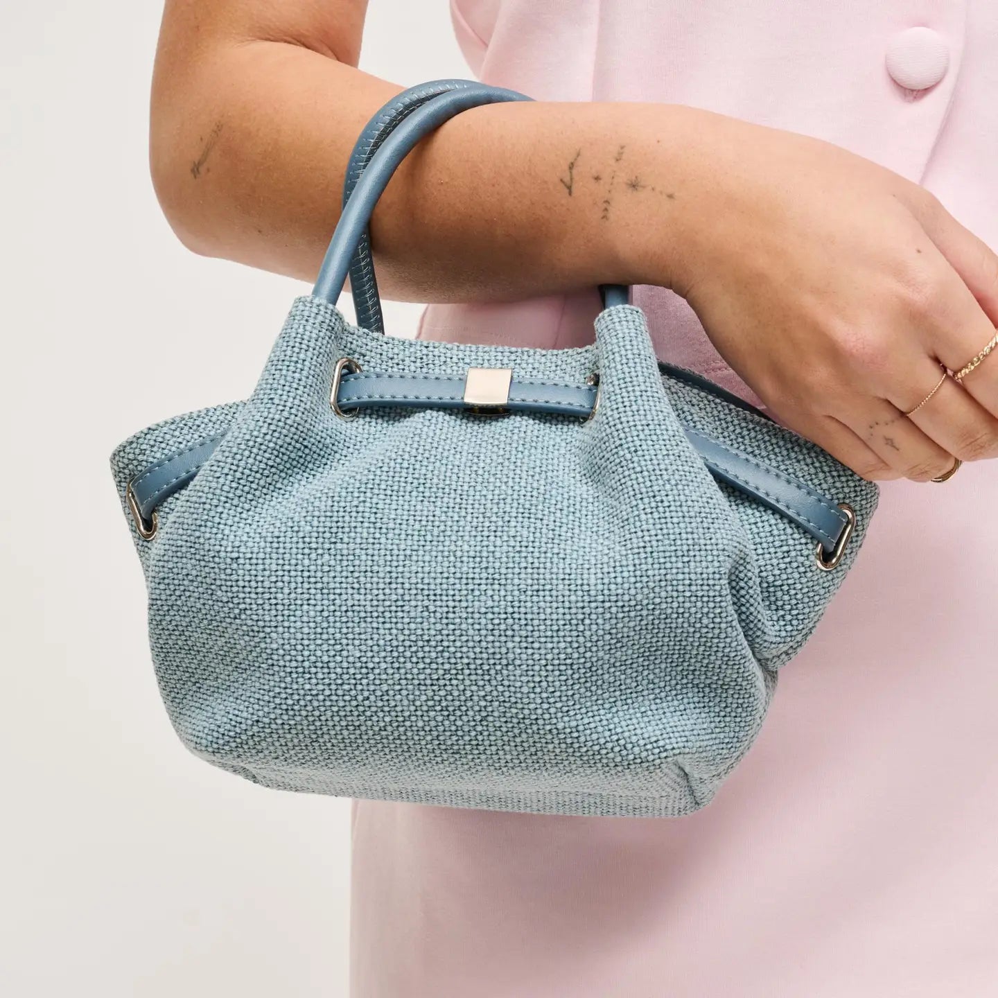 Urban Expressions Selena Color Pop Crossbody bag featuring vibrant colors and a stylish design.