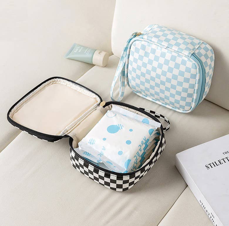 Private label travel checker makeup pouch bag with a sleek design, compact size, and multiple compartments for cosmetics and essentials.