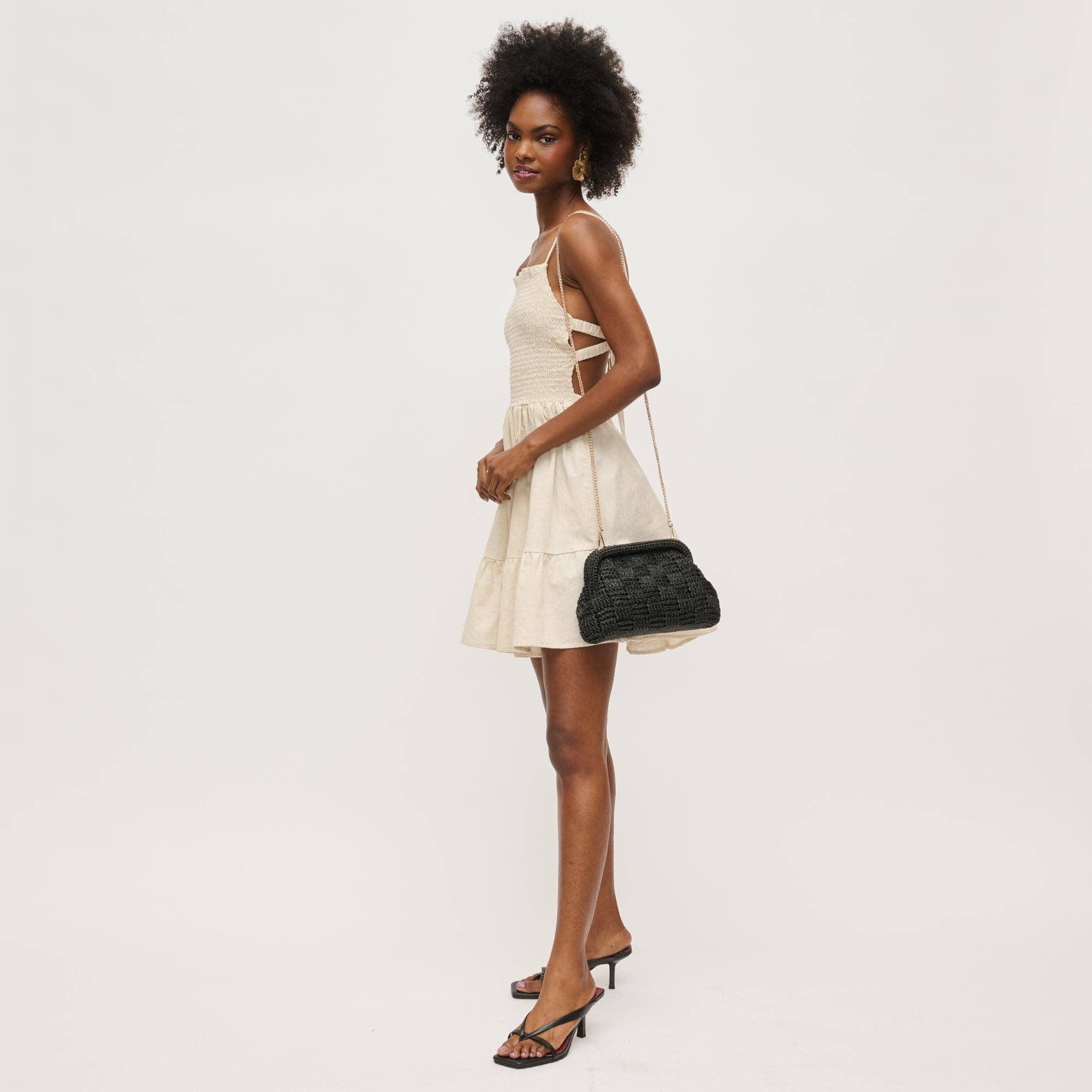 Urban Expressions Annie Clutch in a stylish design, showcasing its sleek shape and textured fabric.
