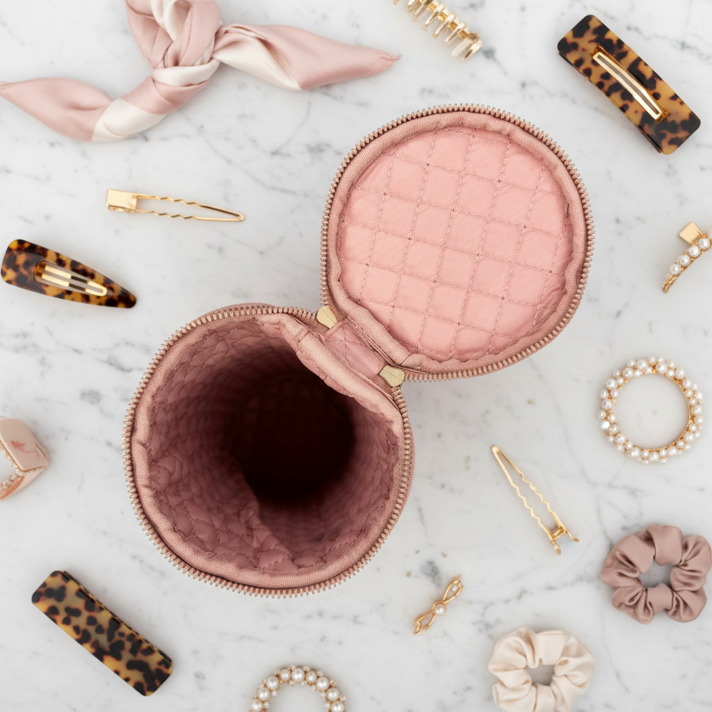 PurseN blush velvet Hot Tools holder cosmetic bag with sleek design and secure zipper closure for storing beauty tools.
