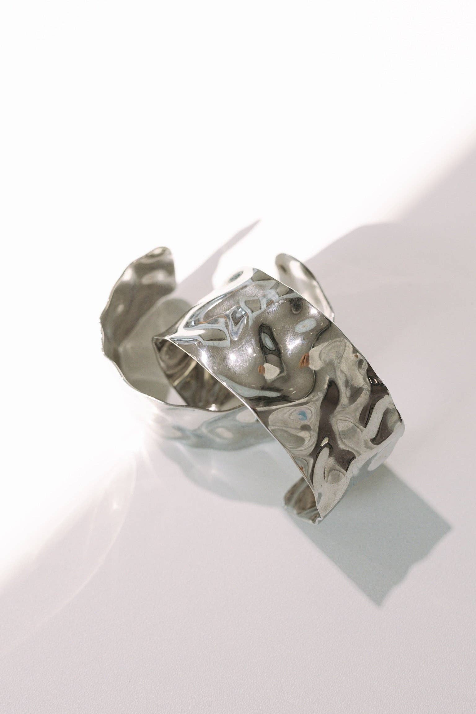 BELJOY Billie Wave Gold Silver Cuff Bracelet featuring a sleek, modern wave design in gold and silver tones.
