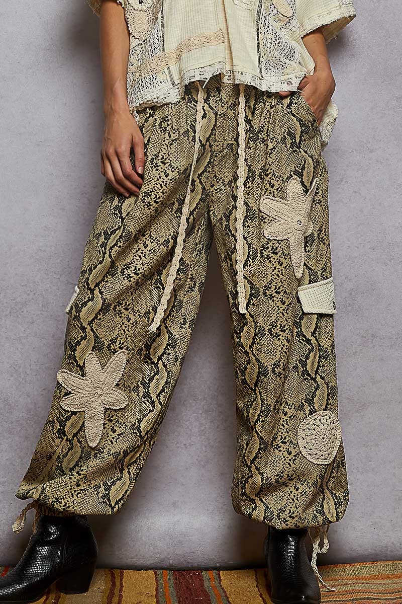 Pol Clothing pleat detail floral patchwork cargo pants with stylish pleats and floral patches on lightweight fabric.