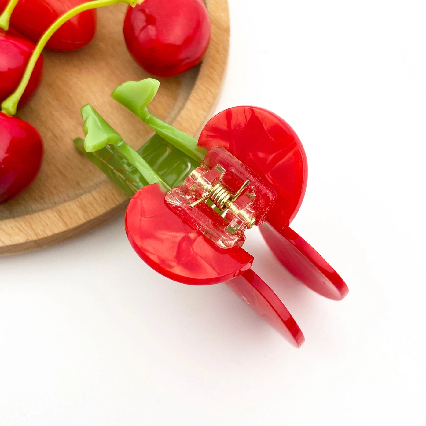 Sweet red cherry claw hair clip with twin cherry design, private label hair accessory for securing hair stylishly.