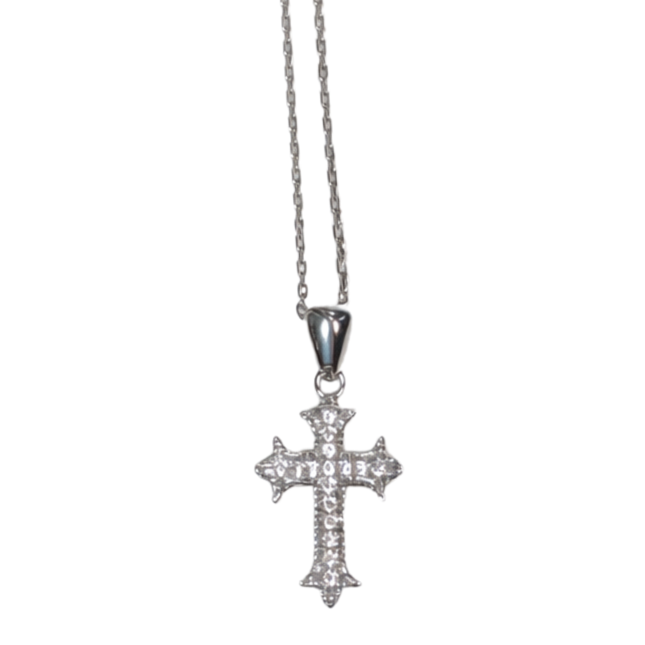 Silver necklace named The Aurelia Cross with a delicate cross pendant, styled with a heart and bow charm, from Private Label.