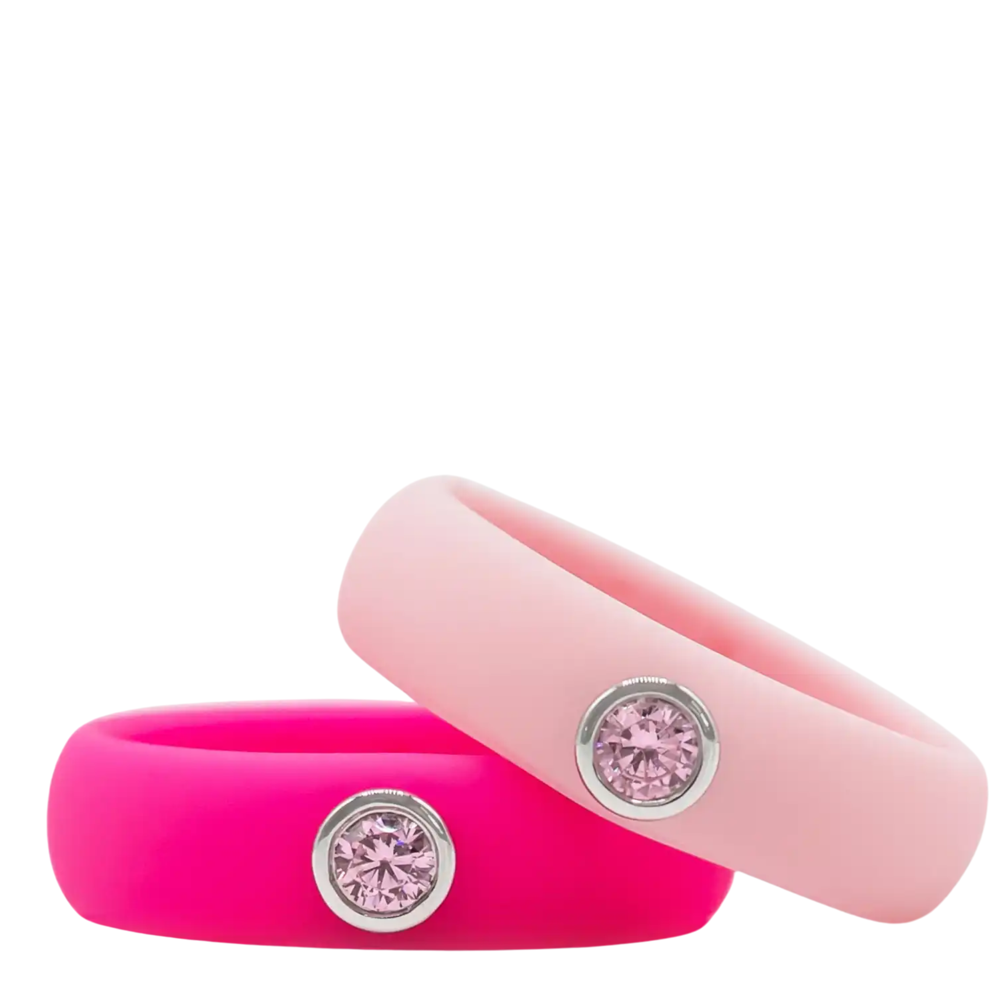 Pink cubic zirconia silicone ring by Gemslique displayed on a soft surface, highlighting its vibrant color and design.