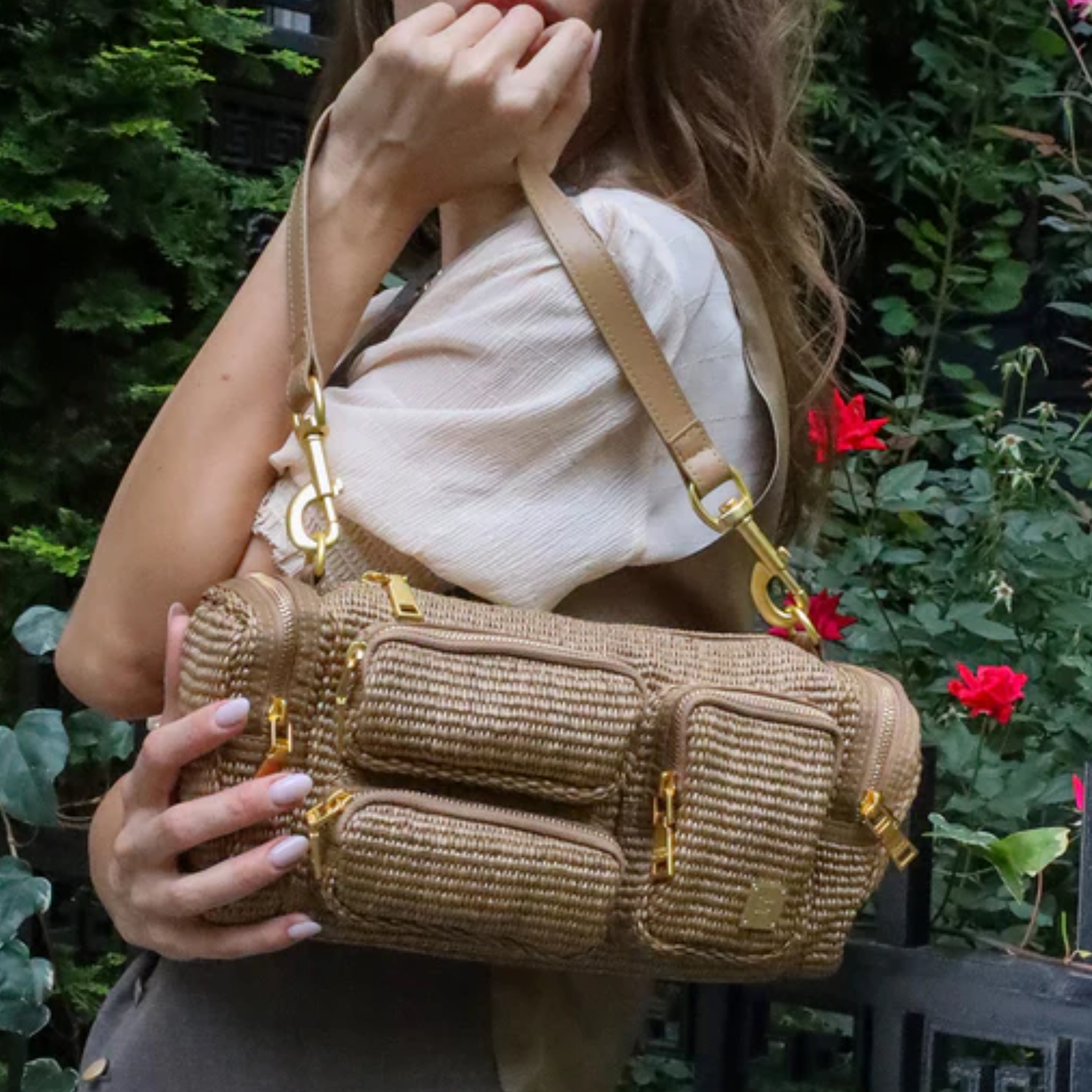 Think Royln Lady Cargo shoulder bag with heart and bow charm, featuring a stylish design and spacious interior.