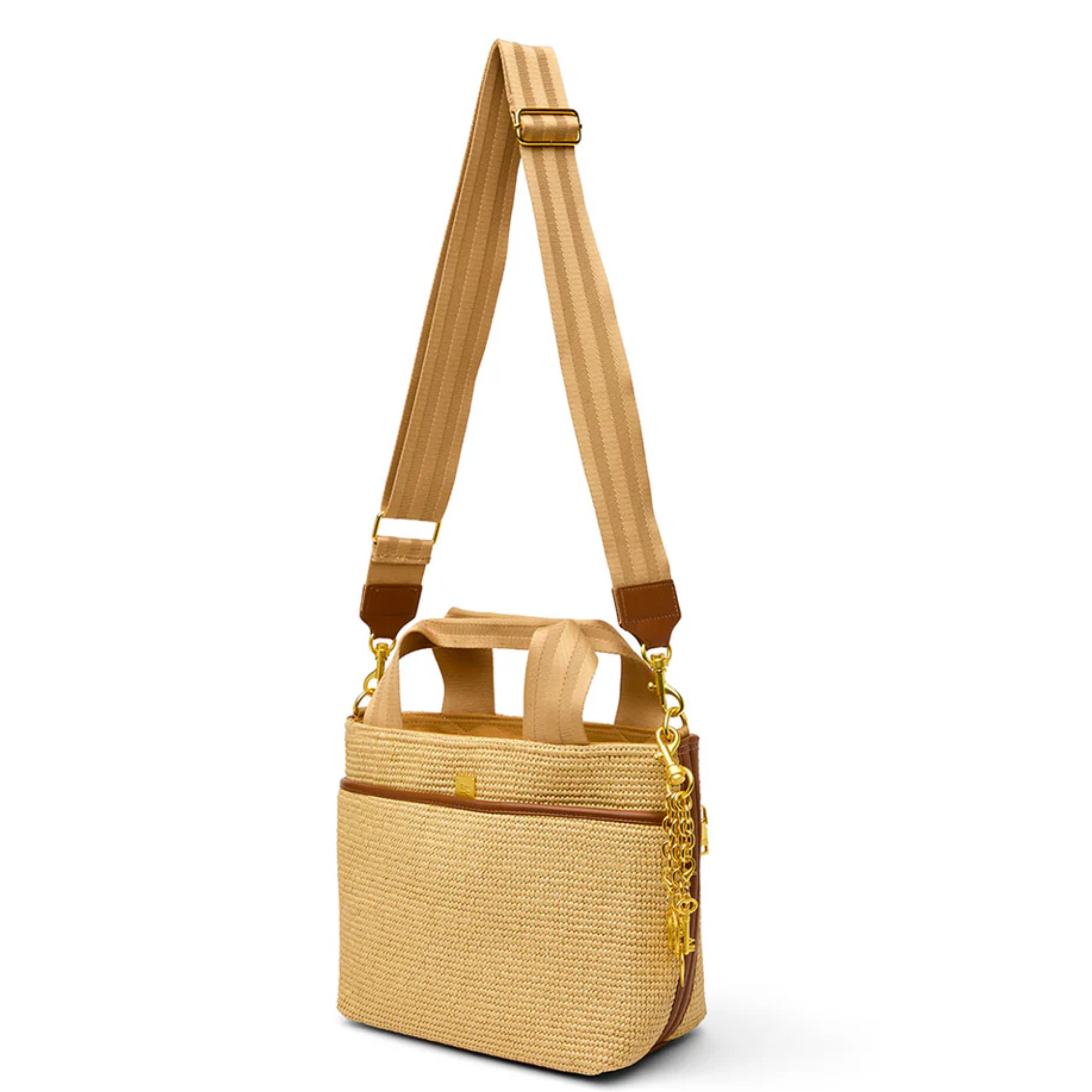 Think Royln Escape crossbody bag featuring a coquette heart and bow bag charm on a stylish black bag.