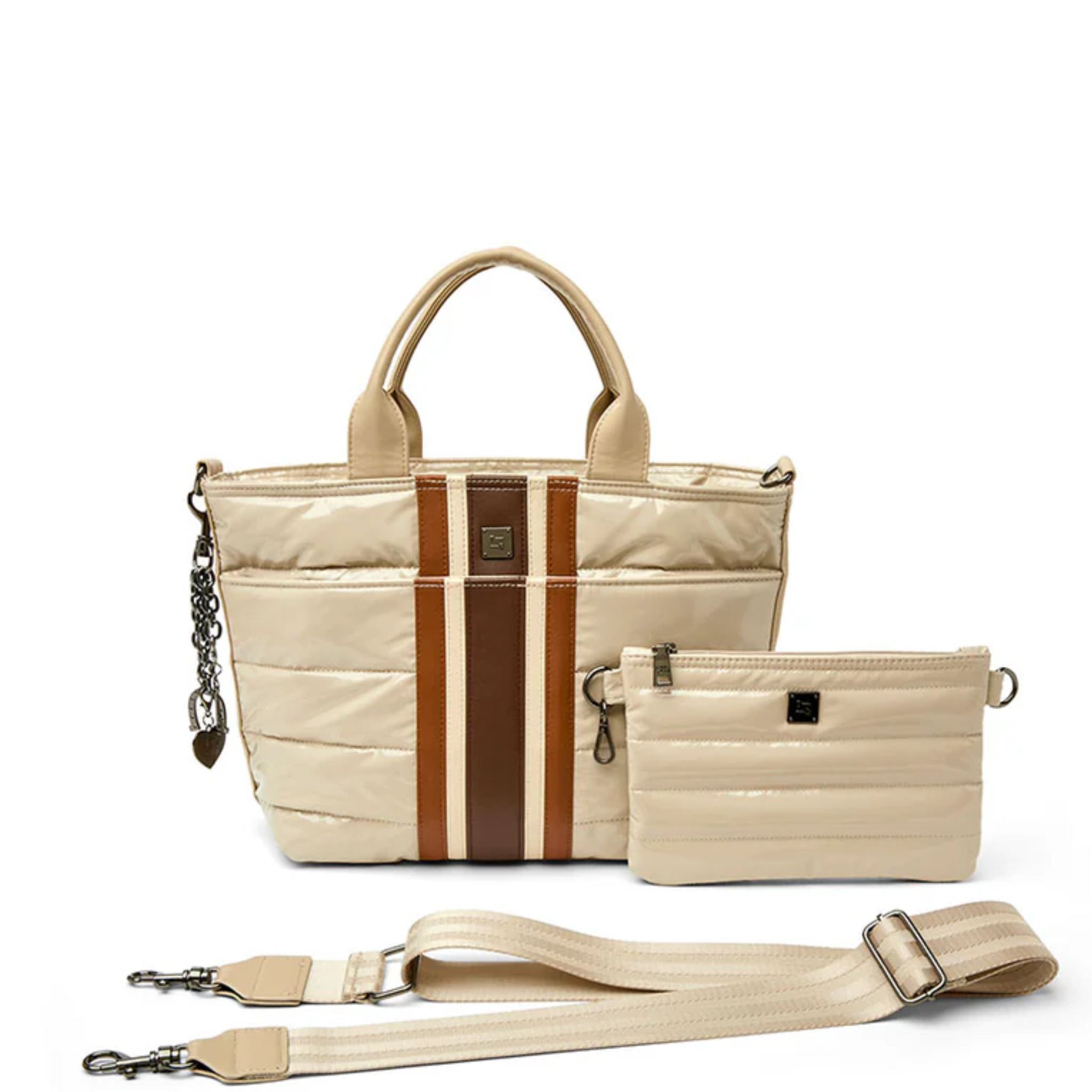Think Royln Getaway travel bag with coquette heart and bow bag charm, stylish and functional for travel accessories.