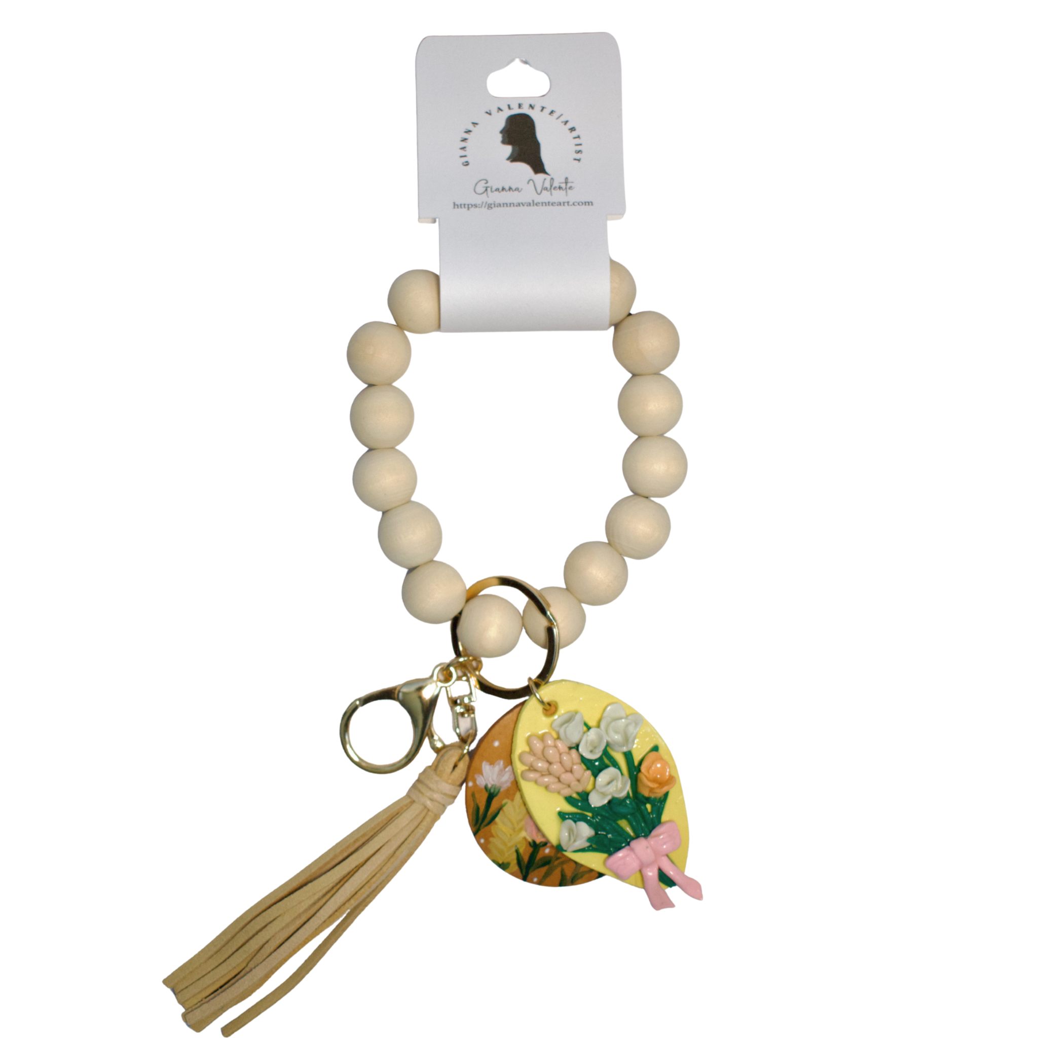 Colorful hand-painted ceramic keychain featuring a coquette heart and bow design by Gianna Valente x Lets Bag It.