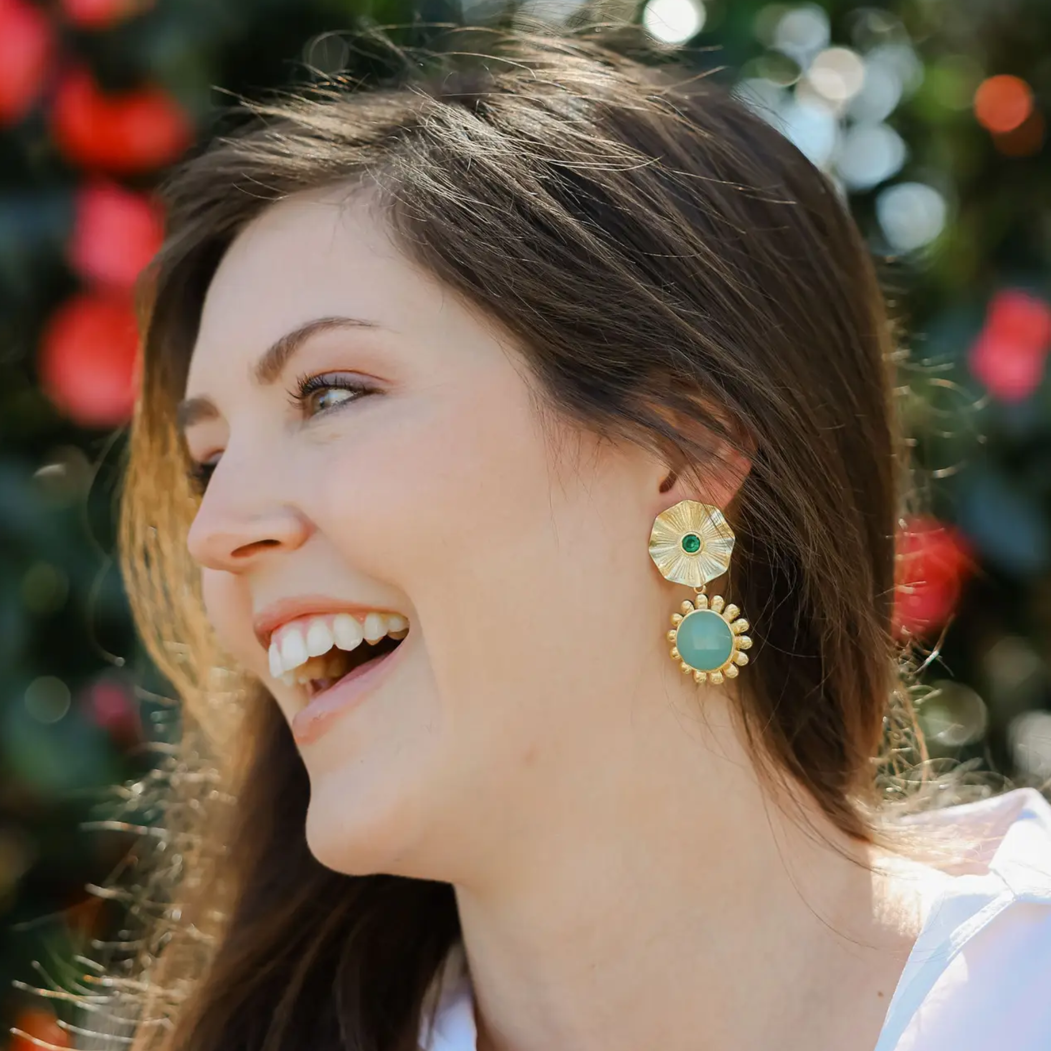 Colorful gemstone earrings by Private Label featuring vibrant multicolor stones and a stylish clip-on design.