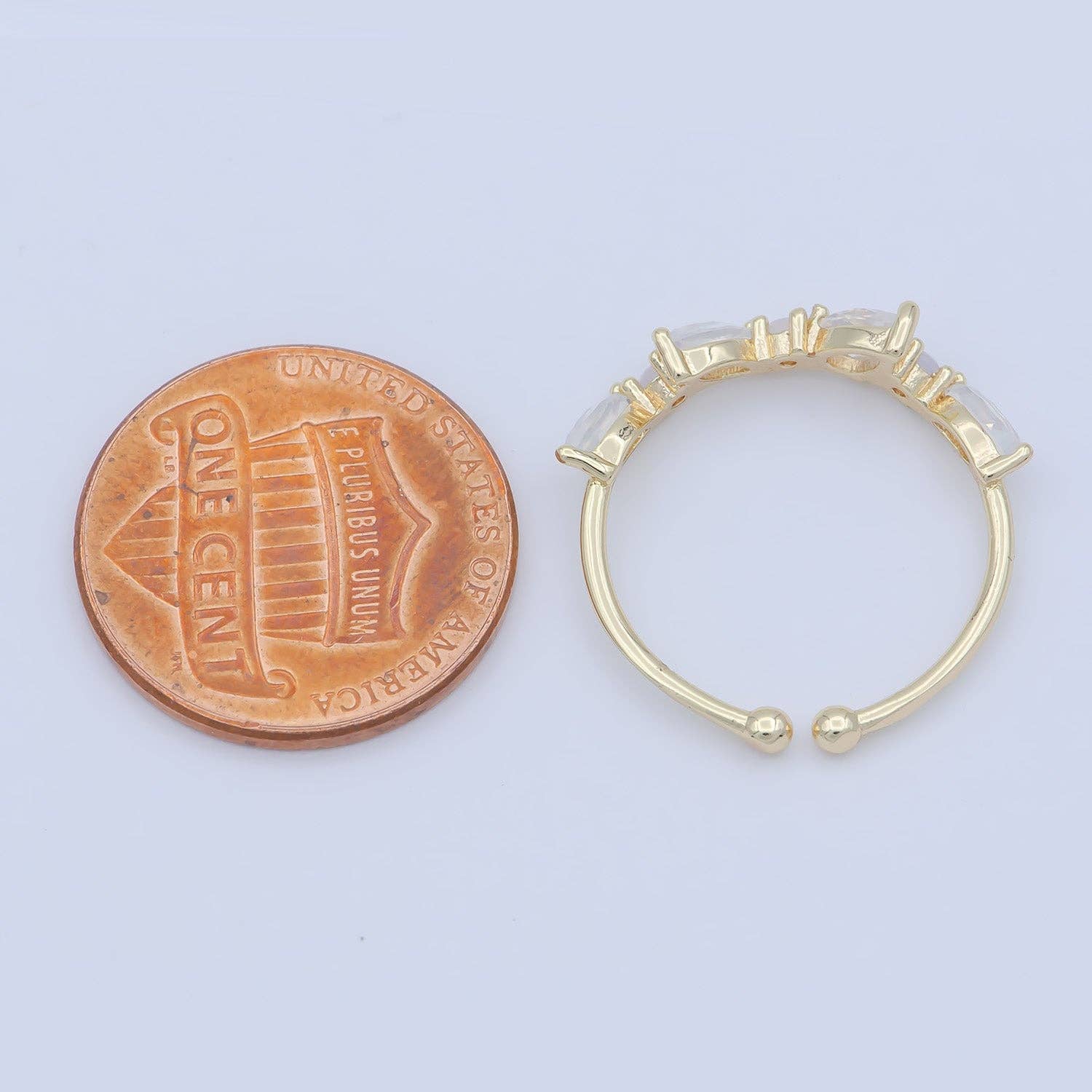 Dainty marquise ring with a delicate design, featuring a shimmering gemstone set in a sleek band.