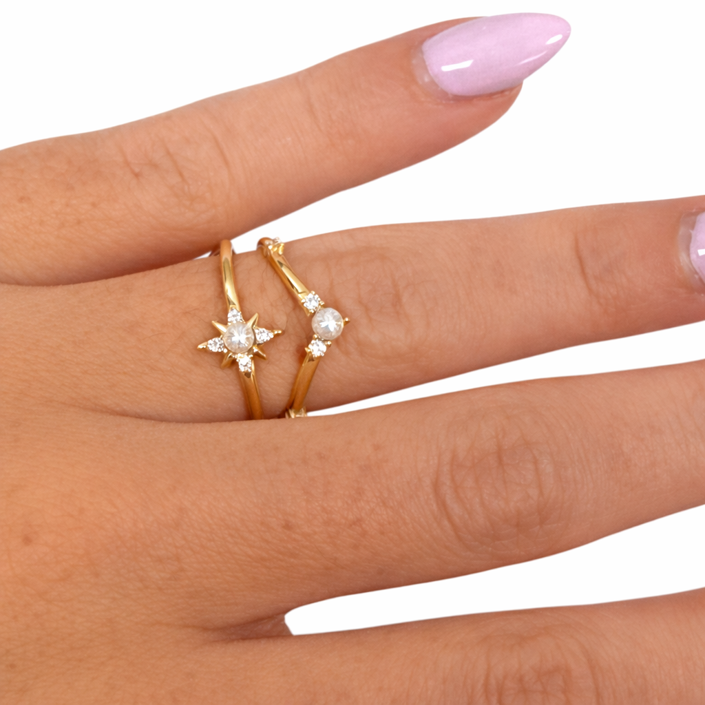 Pearl sunburst stacking ring from Private Label featuring a delicate design with a central pearl and radiant accents.