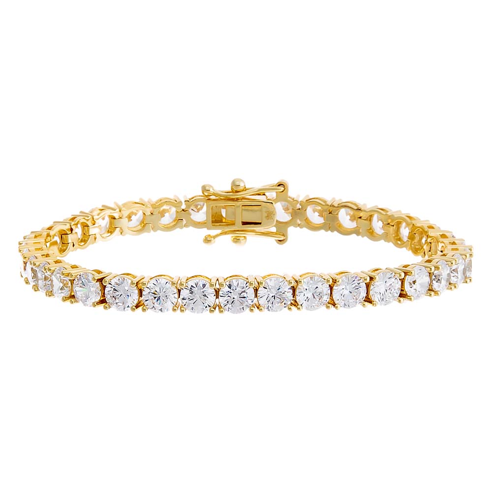 Gold bracelet with clear gemstones on a white background