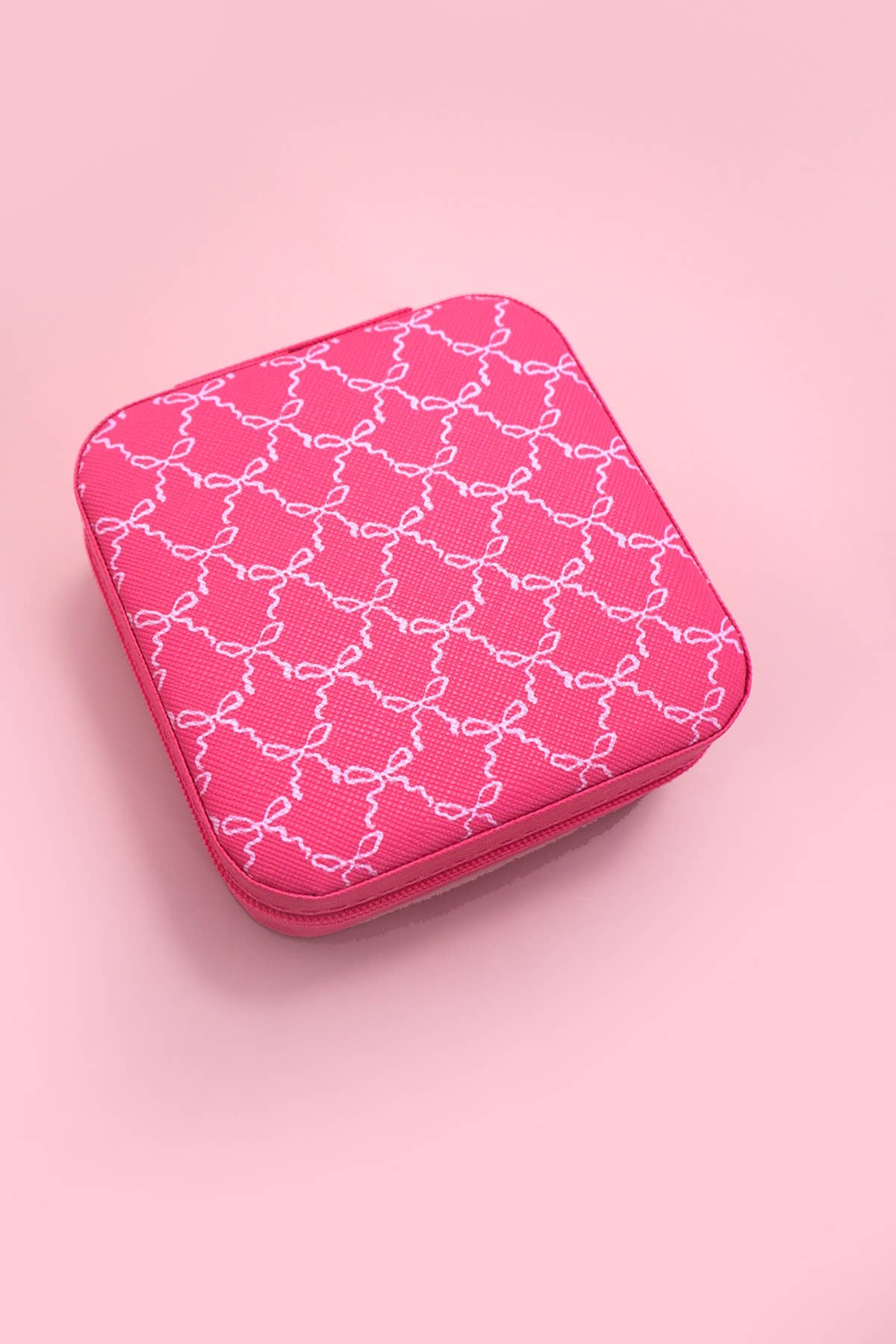 Private label Coquette jewelry organizer travel pouch with compartments for jewelry storage and easy portability.