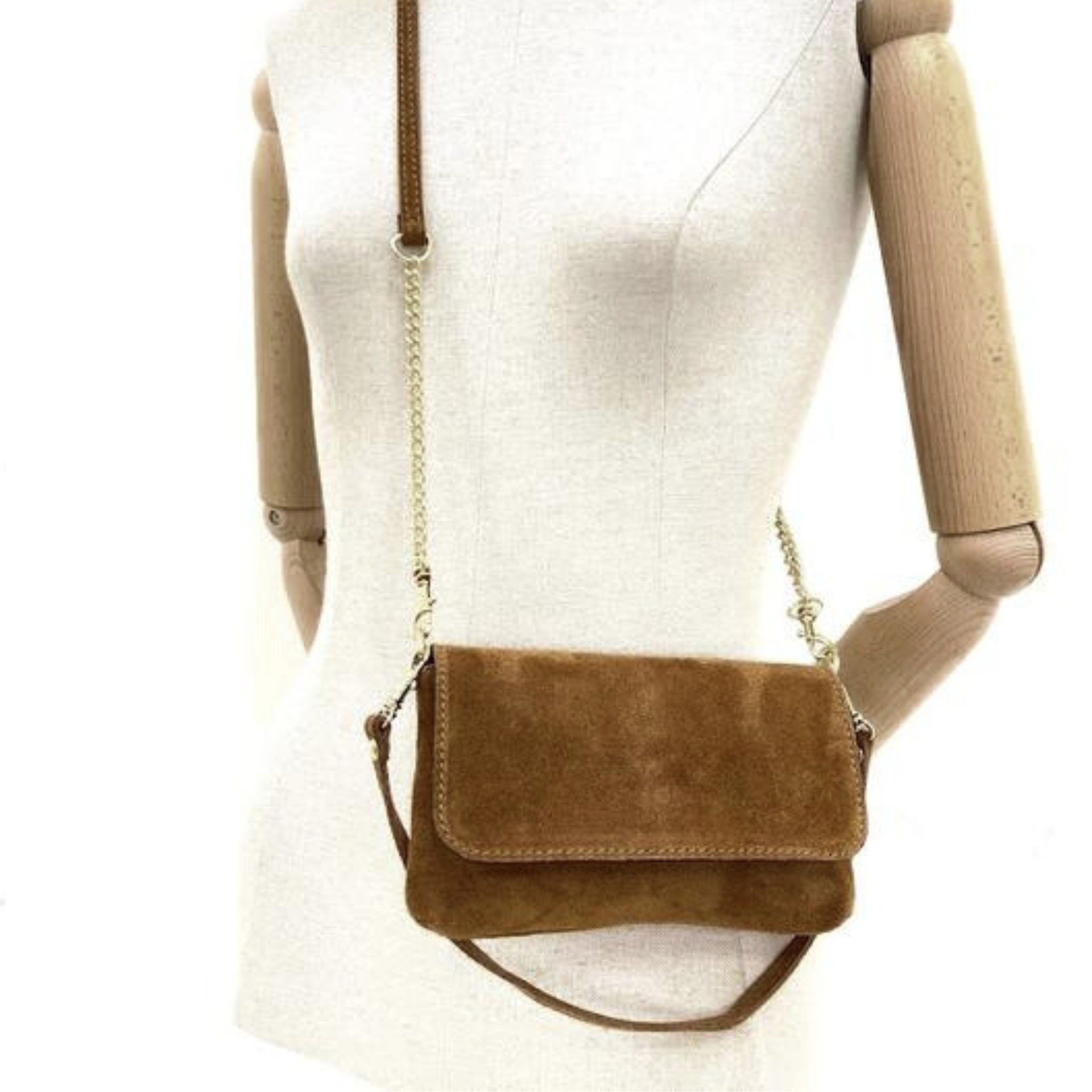 Mini suede shoulder bag in tan, featuring a crossbody strap and stylish design, perfect for everyday use.