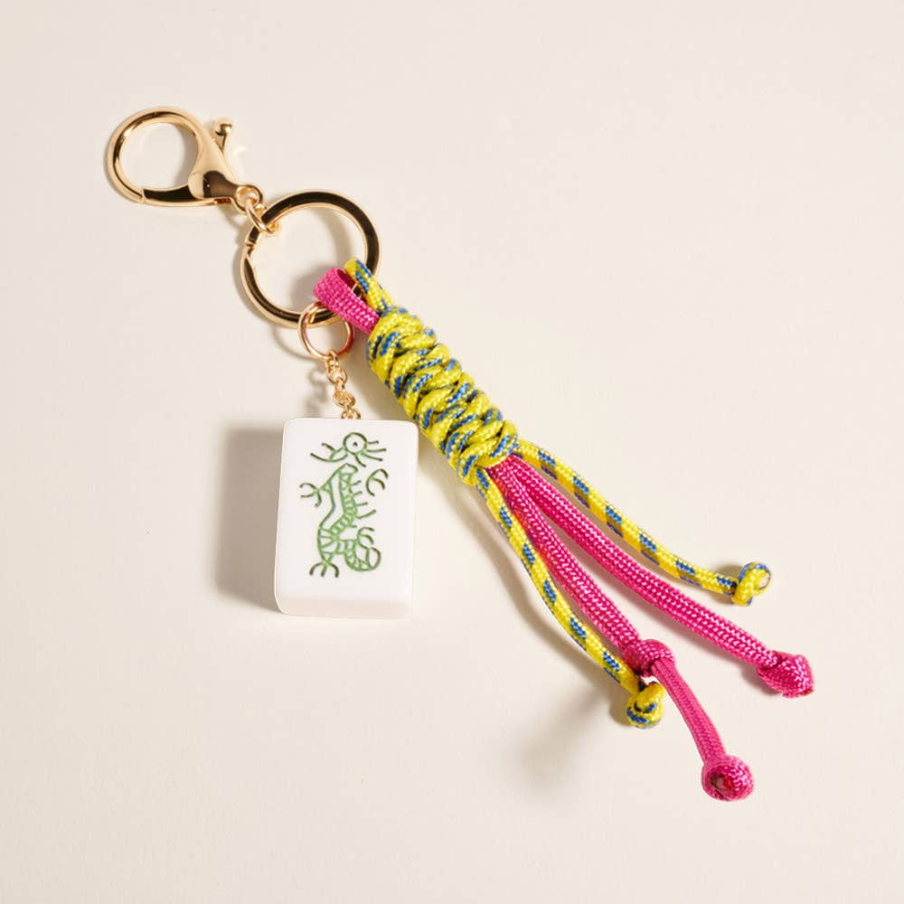 Mahjong tile knot strap drop keychain bag charm featuring a decorative Mahjong tile design with a stylish knot strap.
